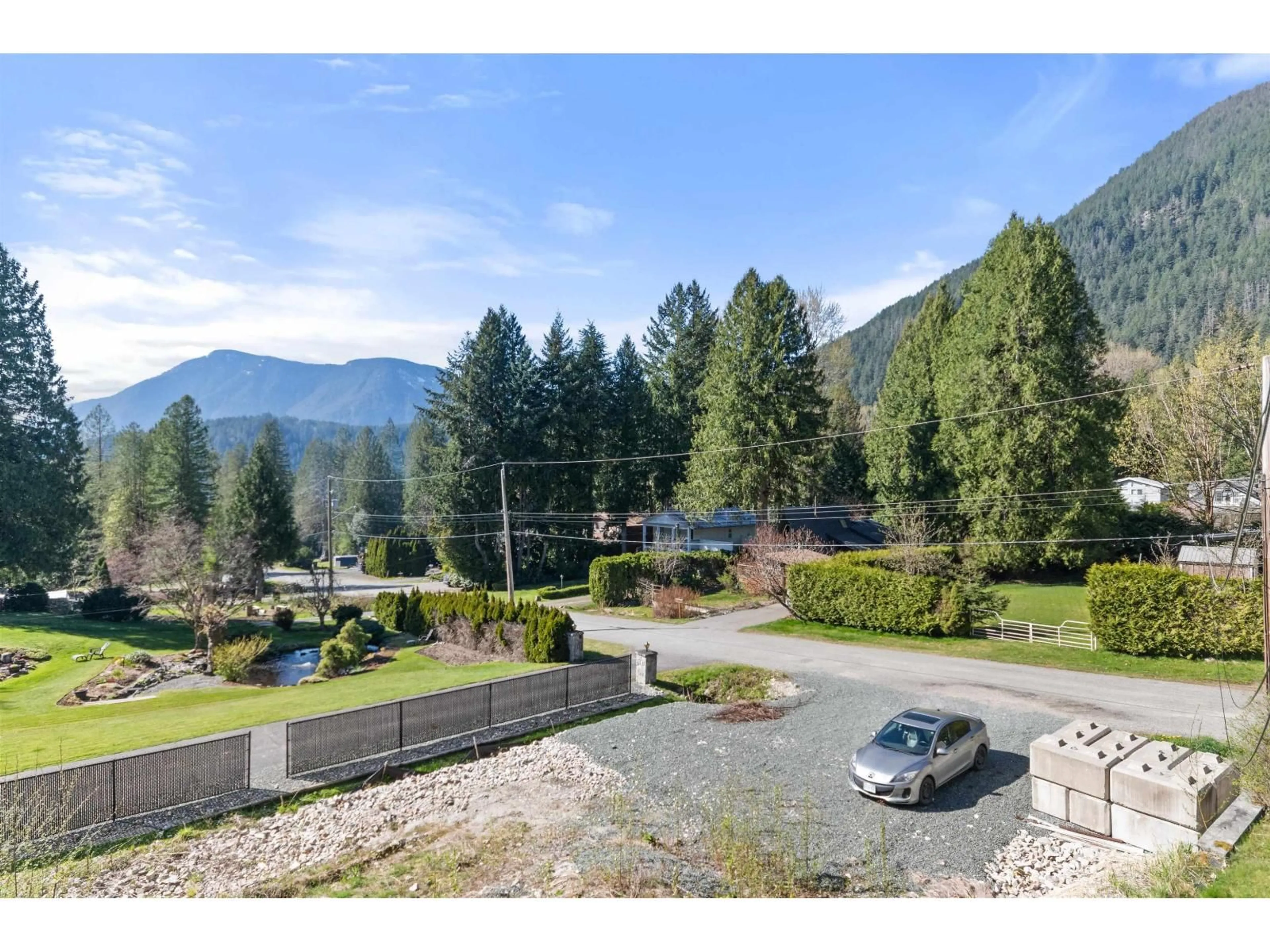 A pic from outside/outdoor area/front of a property/back of a property/a pic from drone, mountain view for 66662 SUMMER ROAD, Hope British Columbia V0X1L1