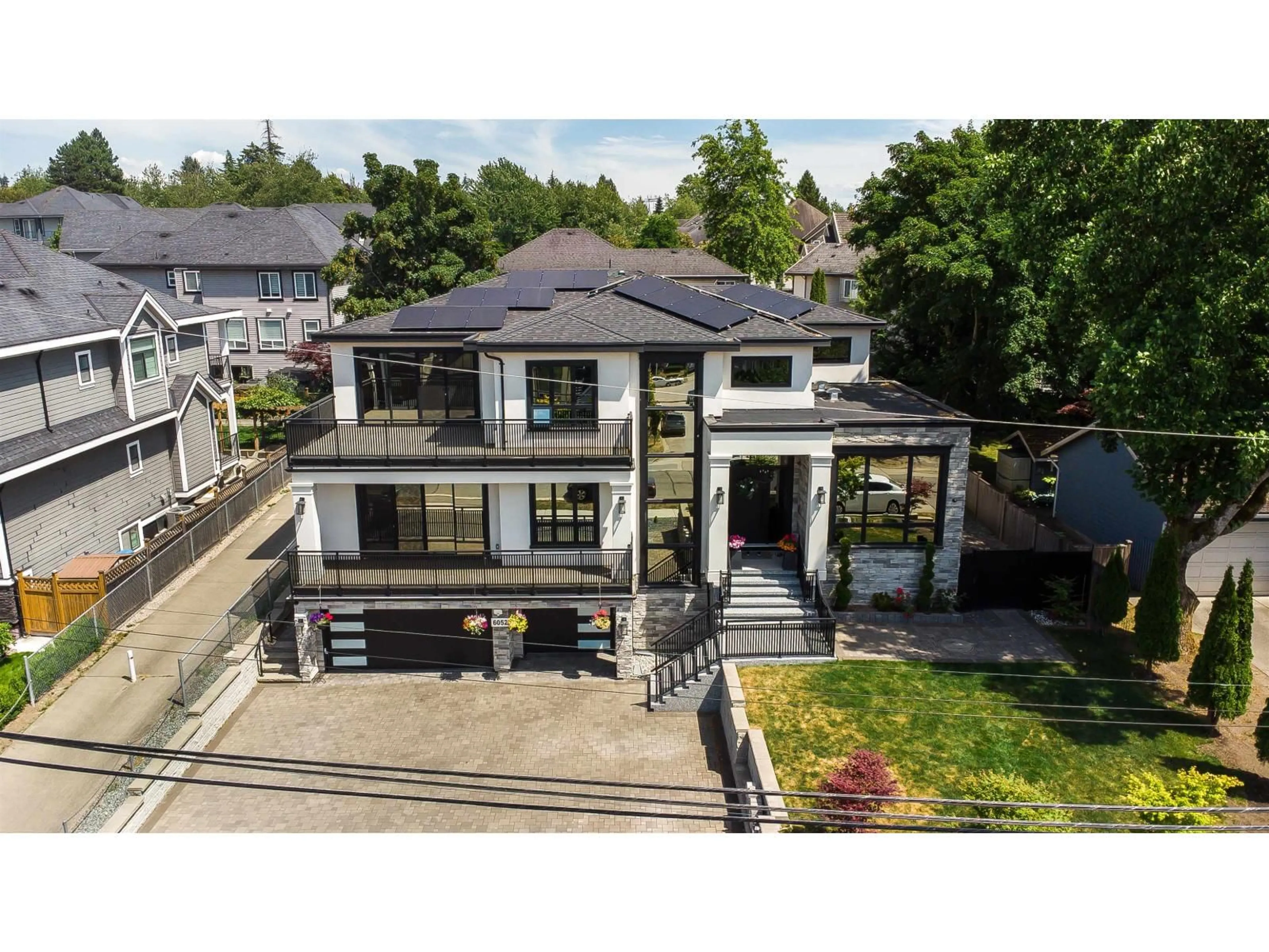 A pic from outside/outdoor area/front of a property/back of a property/a pic from drone, street for 6052 181A STREET, Surrey British Columbia V3S4M2
