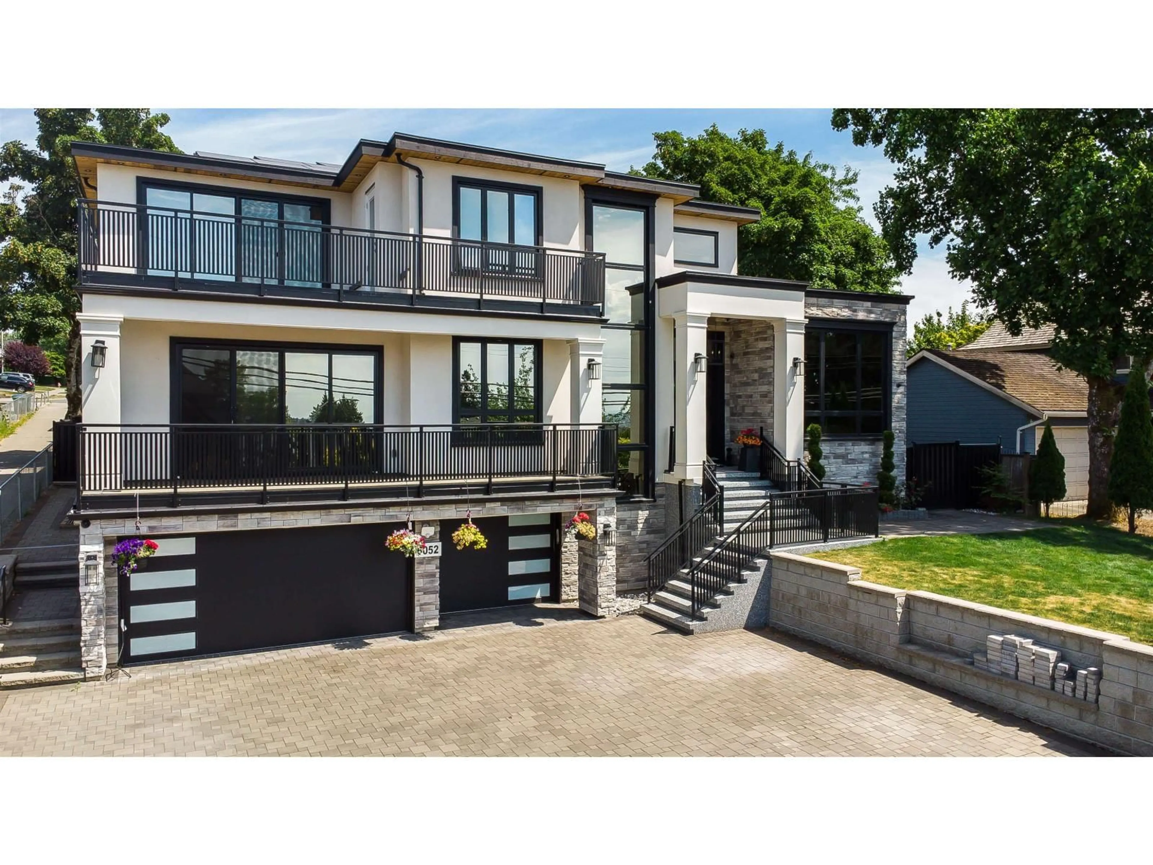 Home with brick exterior material, street for 6052 181A STREET, Surrey British Columbia V3S4M2