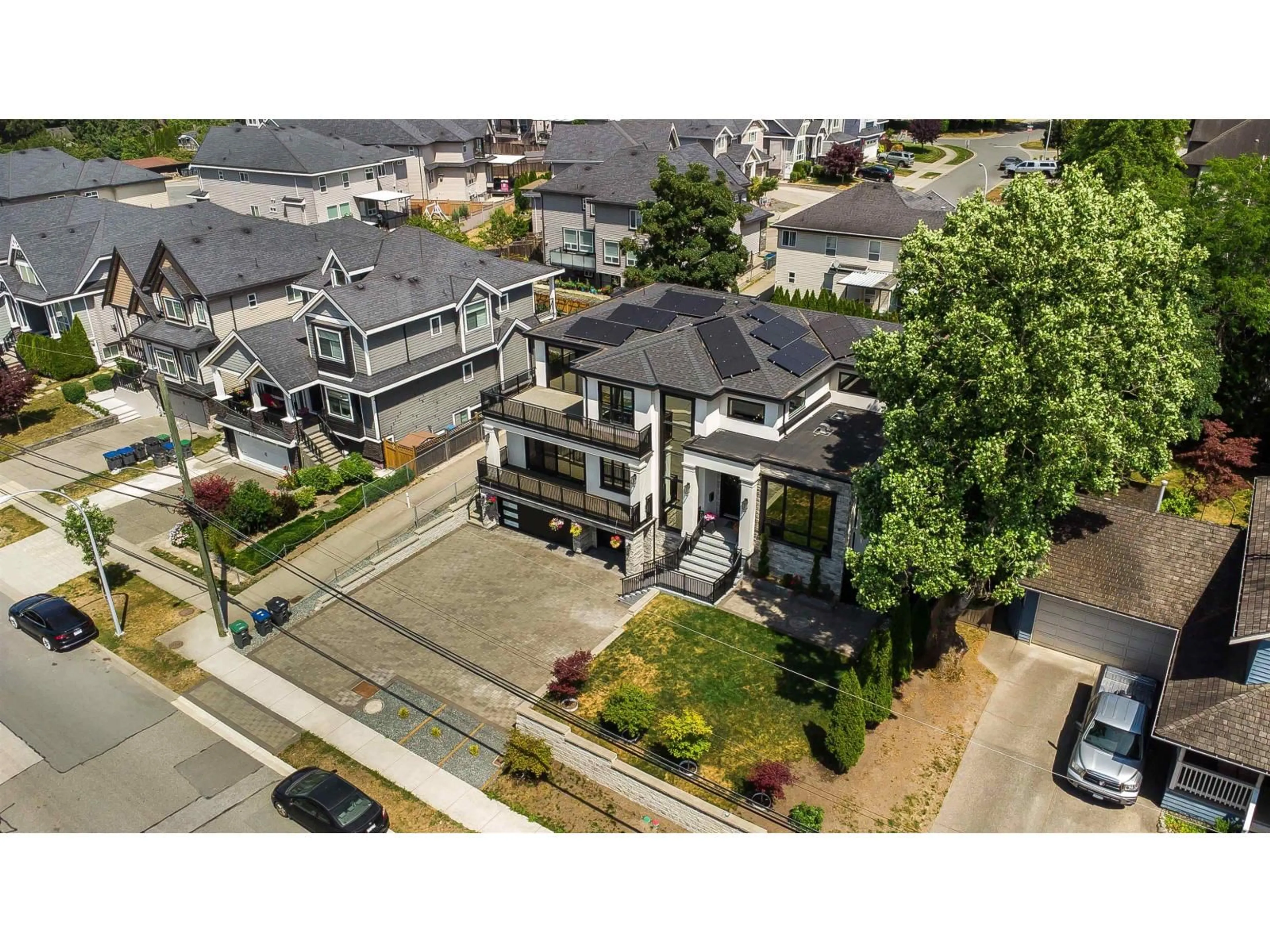 A pic from outside/outdoor area/front of a property/back of a property/a pic from drone, street for 6052 181A STREET, Surrey British Columbia V3S4M2