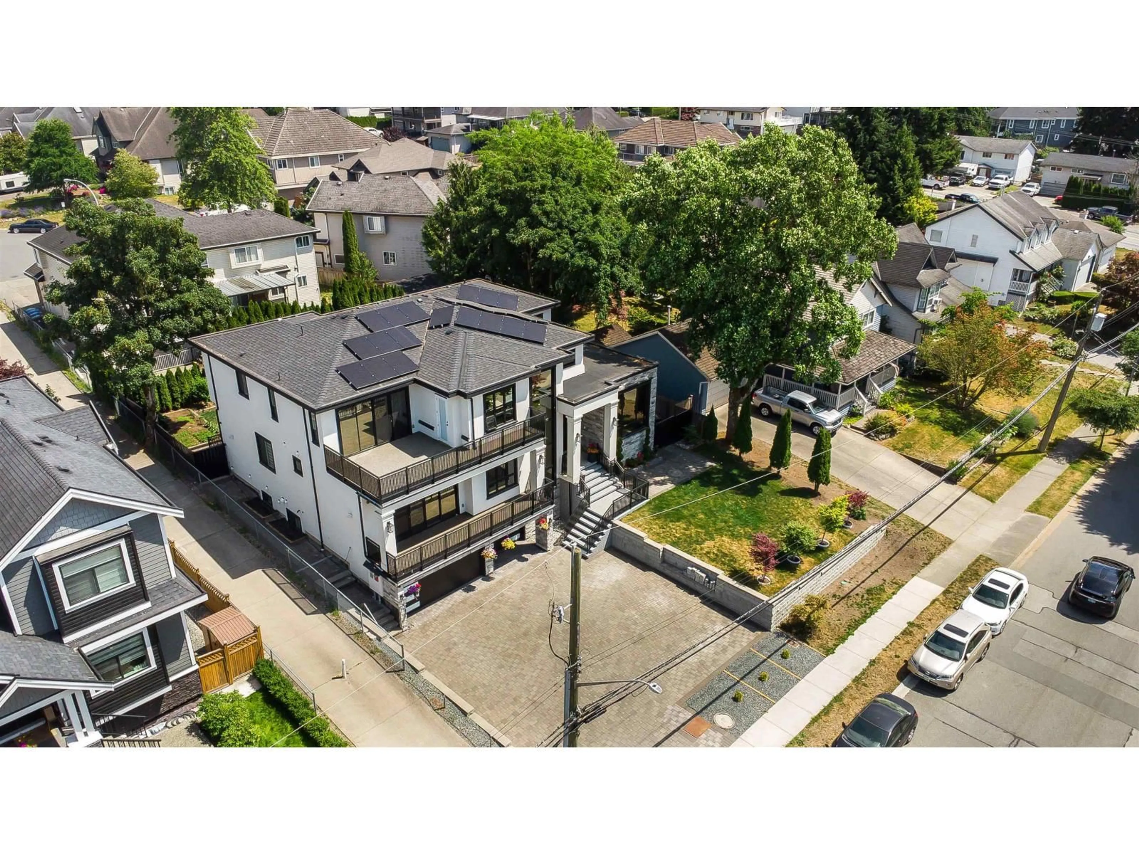 A pic from outside/outdoor area/front of a property/back of a property/a pic from drone, street for 6052 181A STREET, Surrey British Columbia V3S4M2