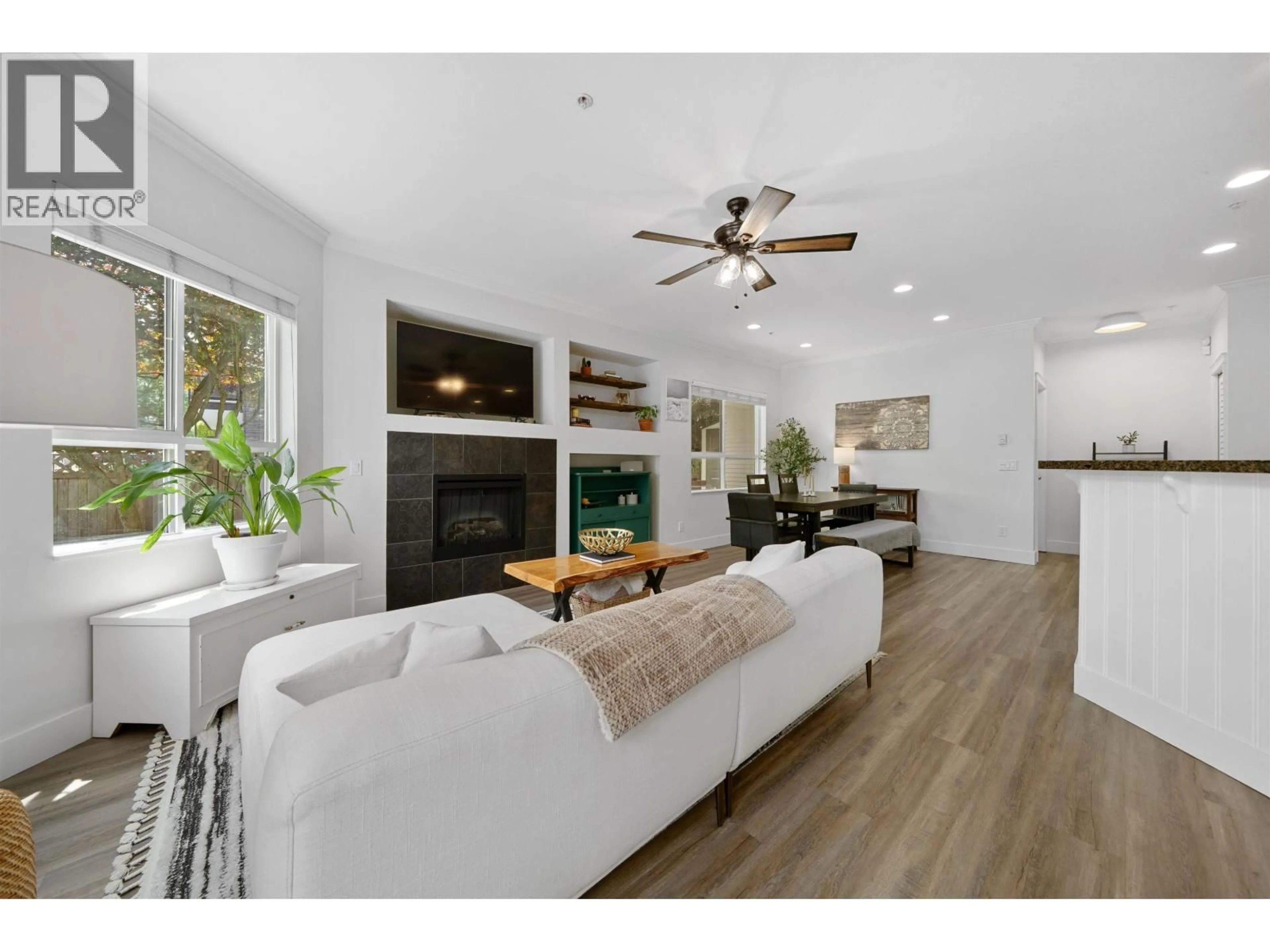 Living room with furniture, wood/laminate floor for 104 - 12090 227 STREET, Maple Ridge British Columbia V2X6J5