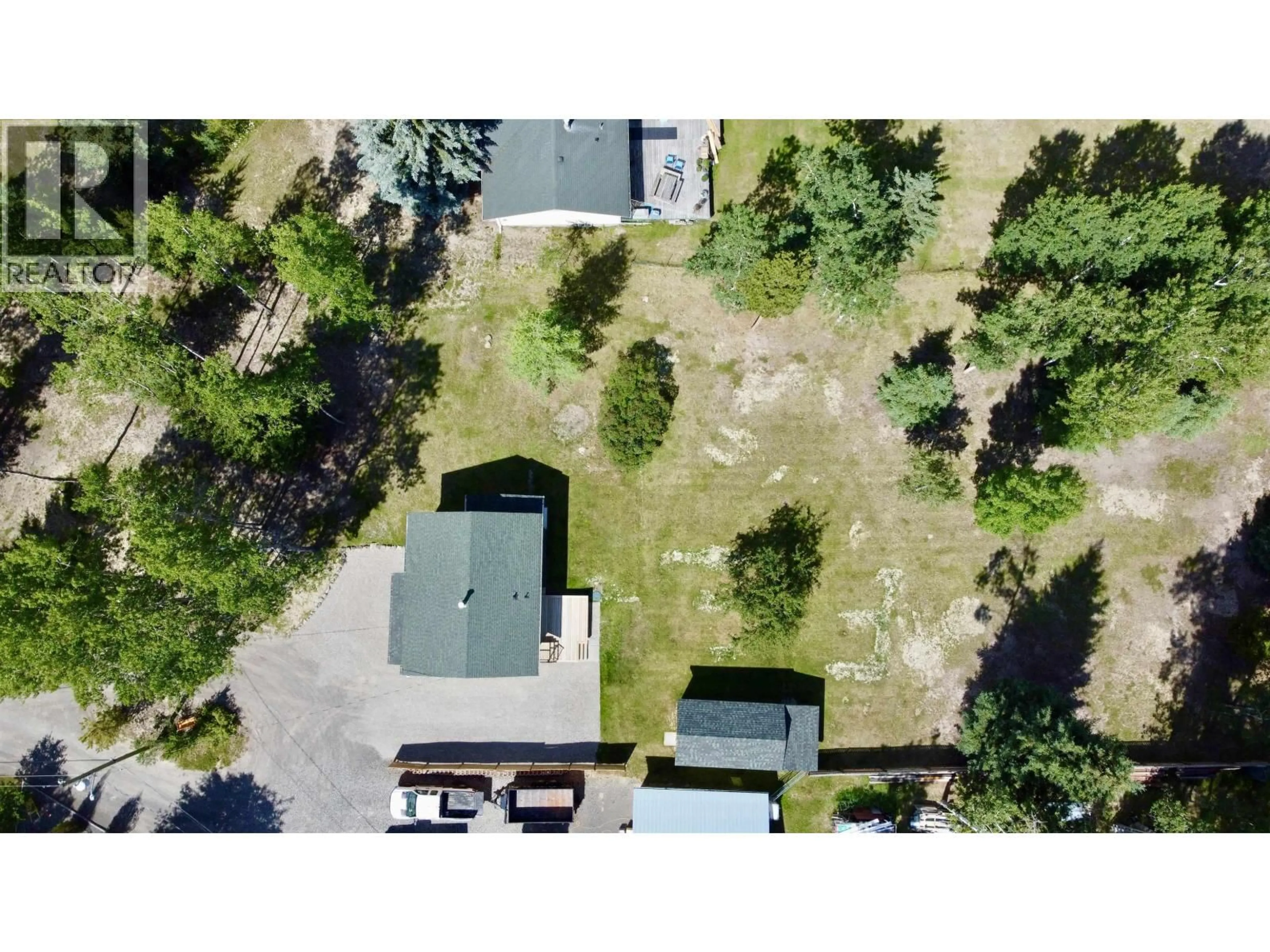 A pic from outside/outdoor area/front of a property/back of a property/a pic from drone, street for 5901 HORSE LAKE ROAD, Horse Lake British Columbia V0K2E3