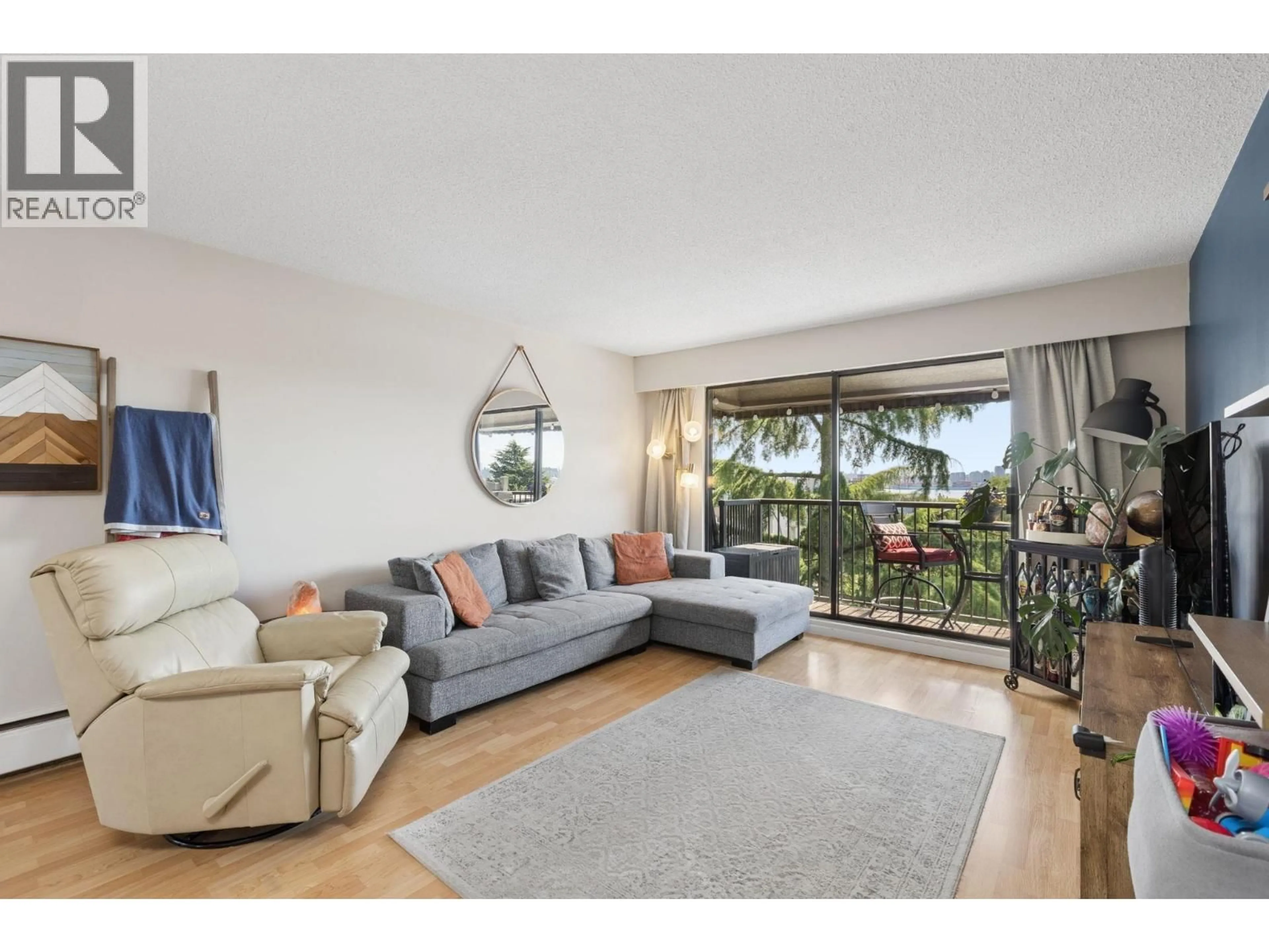 Living room with furniture, unknown for 304 - 252 2ND STREET, North Vancouver British Columbia V7M1C8