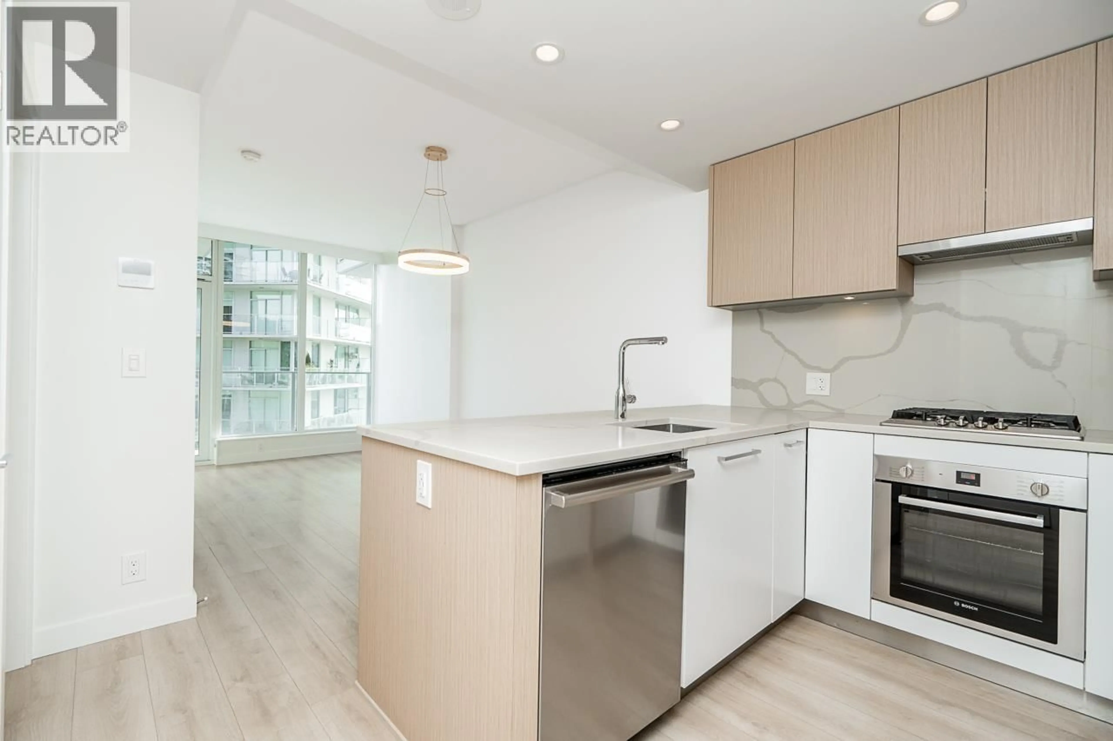 Open concept kitchen, unknown for 606 - 567 CLARKE ROAD, Coquitlam British Columbia V3J0K7