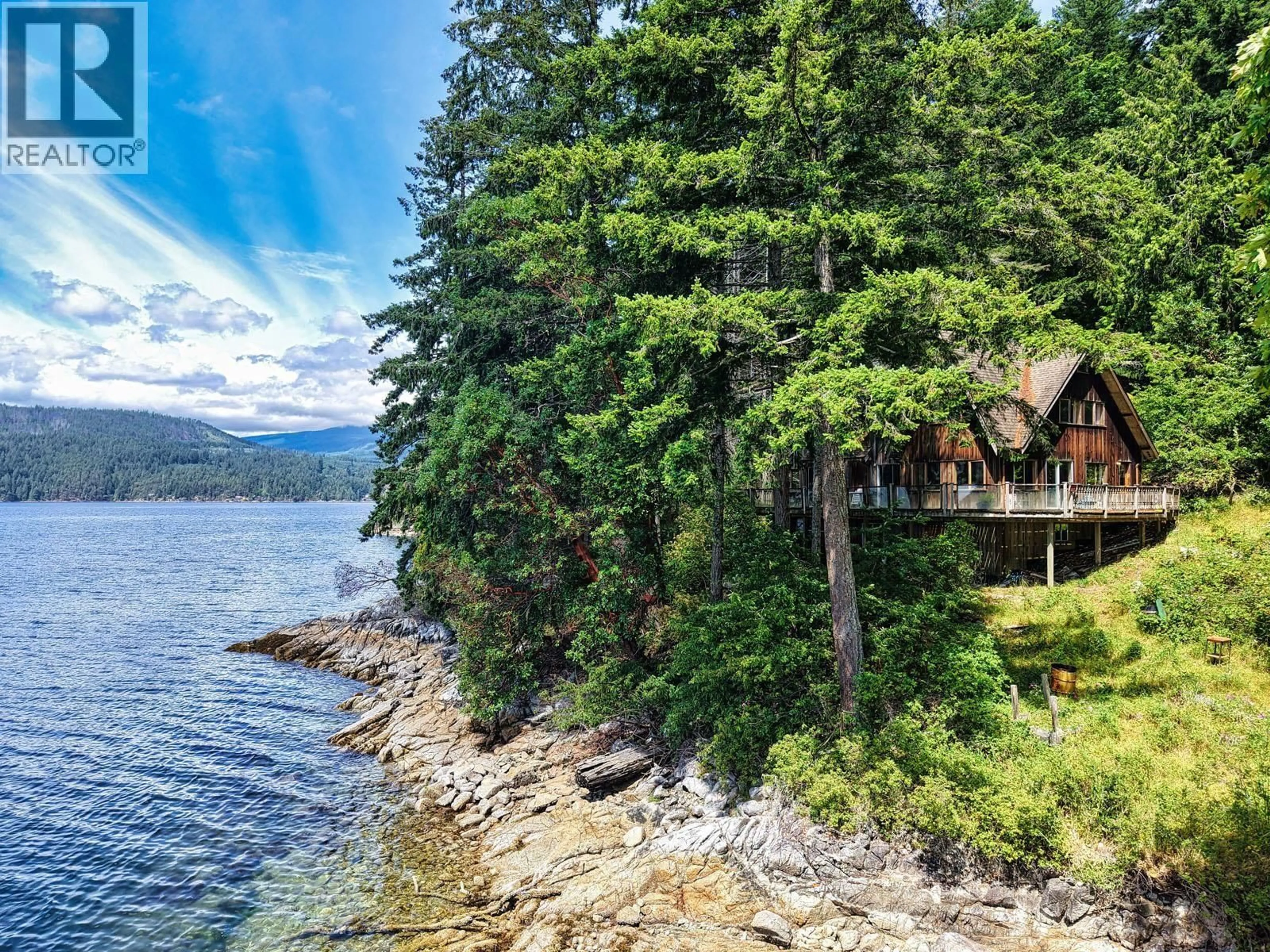A pic from outside/outdoor area/front of a property/back of a property/a pic from drone, water/lake/river/ocean view for 6787 SECHELT INLET ROAD, Sechelt British Columbia V7Z0L2