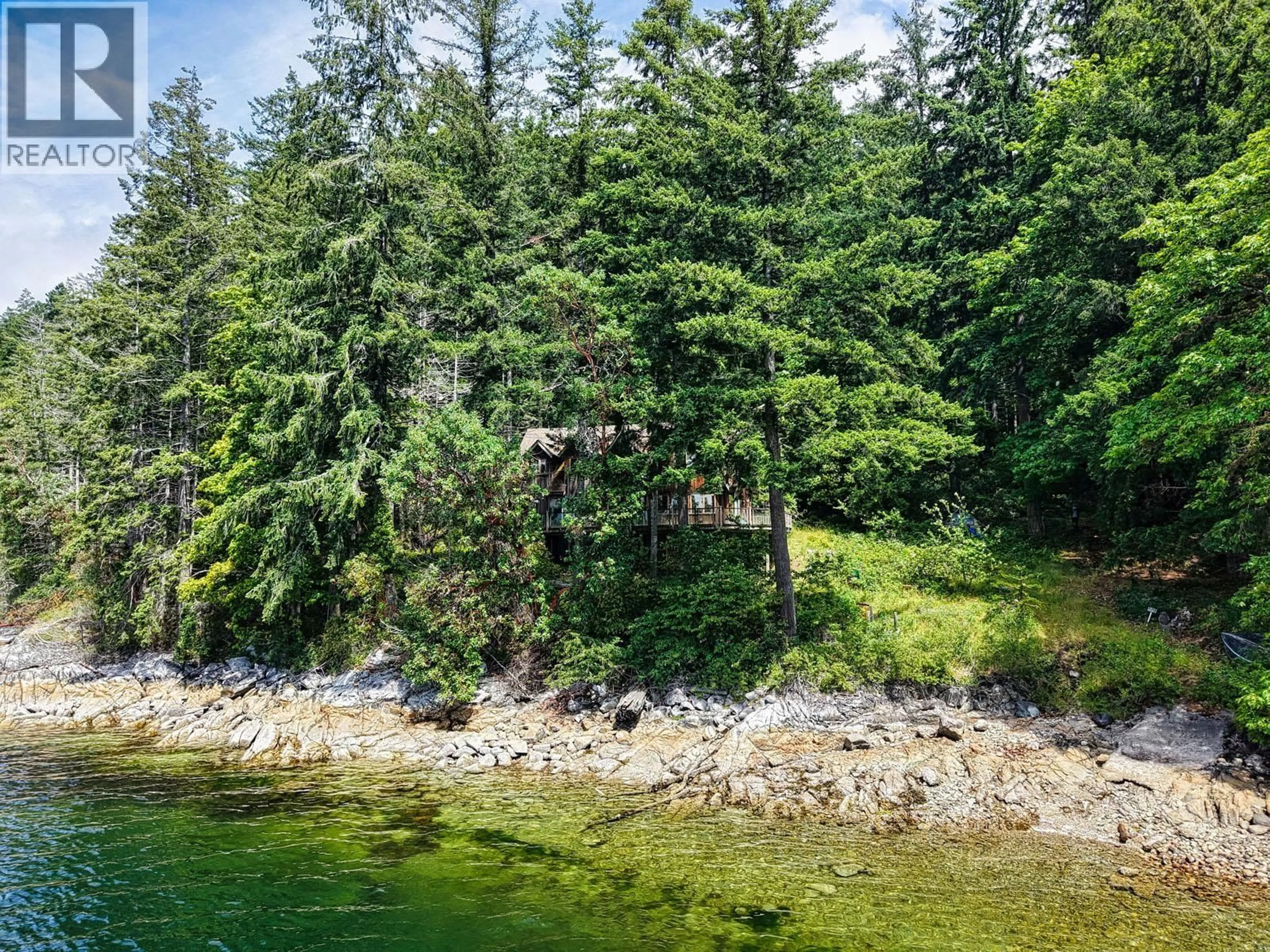 A pic from outside/outdoor area/front of a property/back of a property/a pic from drone, water/lake/river/ocean view for 6787 SECHELT INLET ROAD, Sechelt British Columbia V7Z0L2