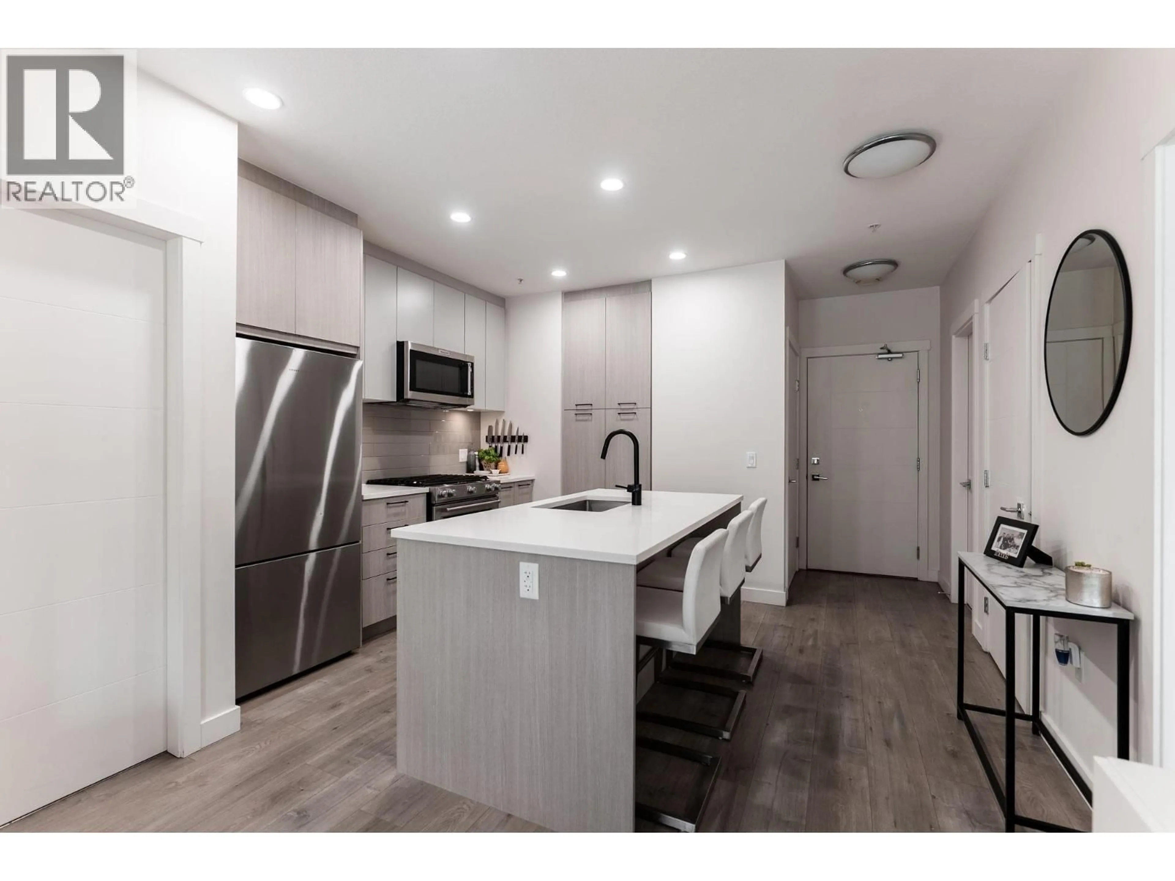 Open concept kitchen, unknown for 206 - 707 COMO LAKE AVENUE, Coquitlam British Columbia V3J0J5