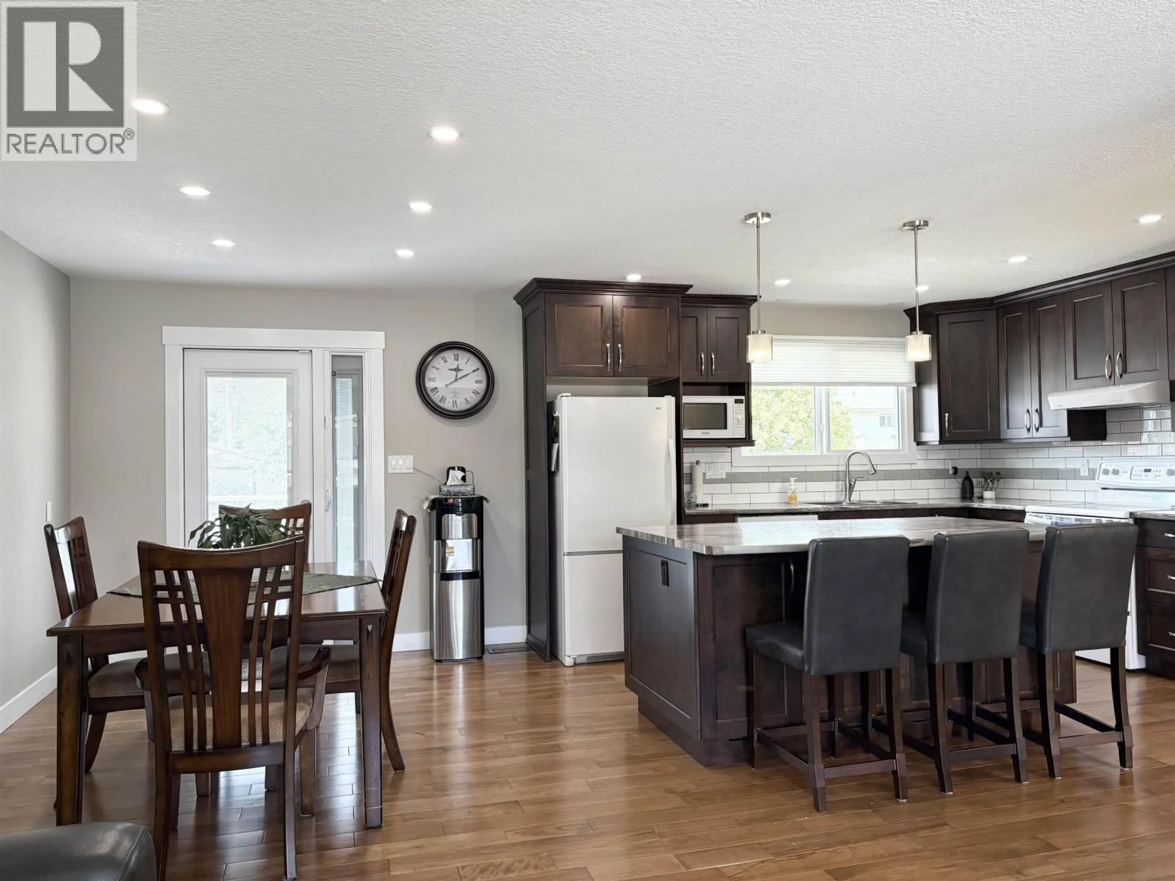 Open concept kitchen, wood/laminate floor for 2845 LONSDALE STREET, Prince George British Columbia V2L4W9