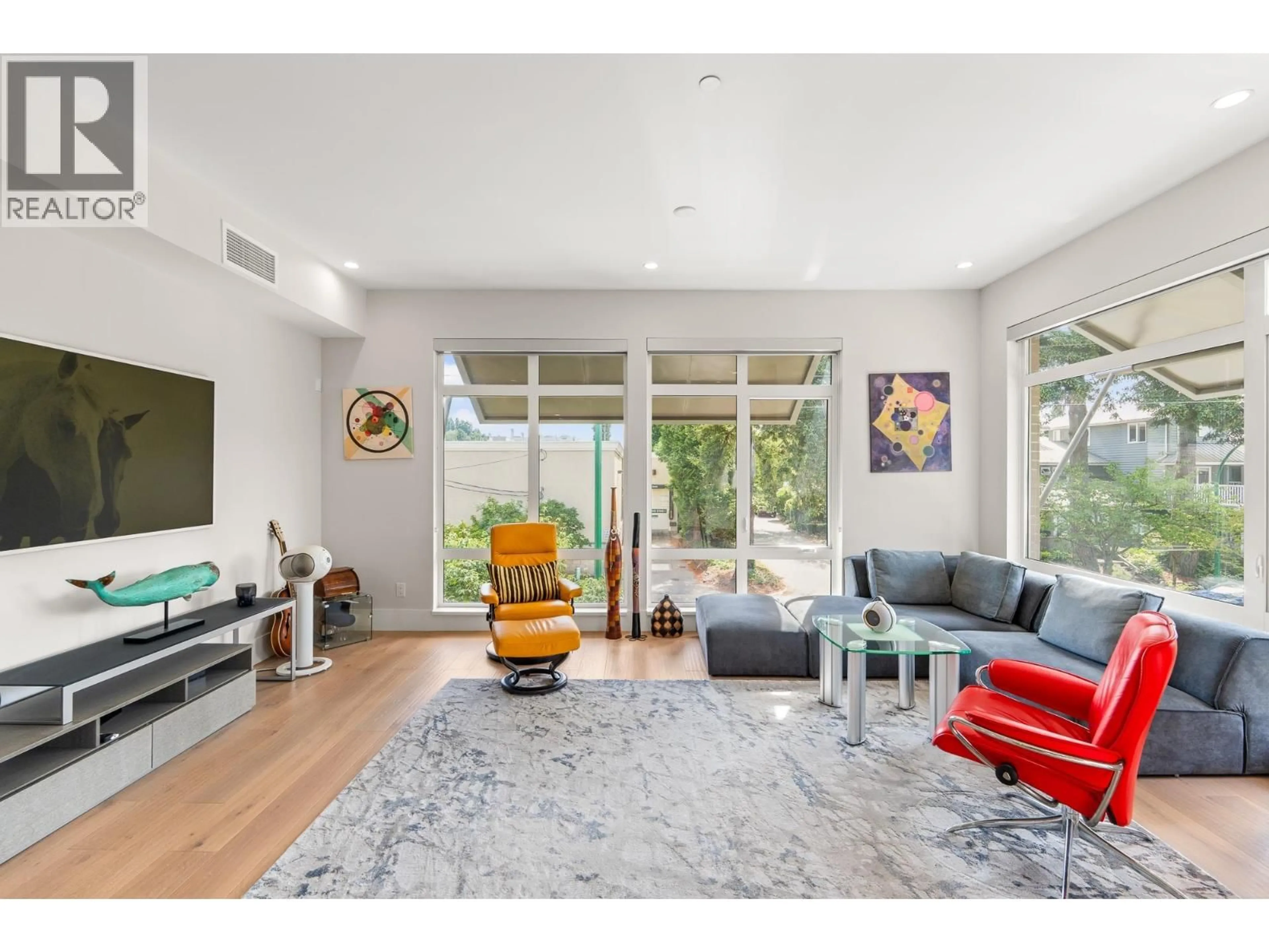 Living room with furniture, unknown for 202 - 1591 BOWSER AVENUE, North Vancouver British Columbia V7P2Y4