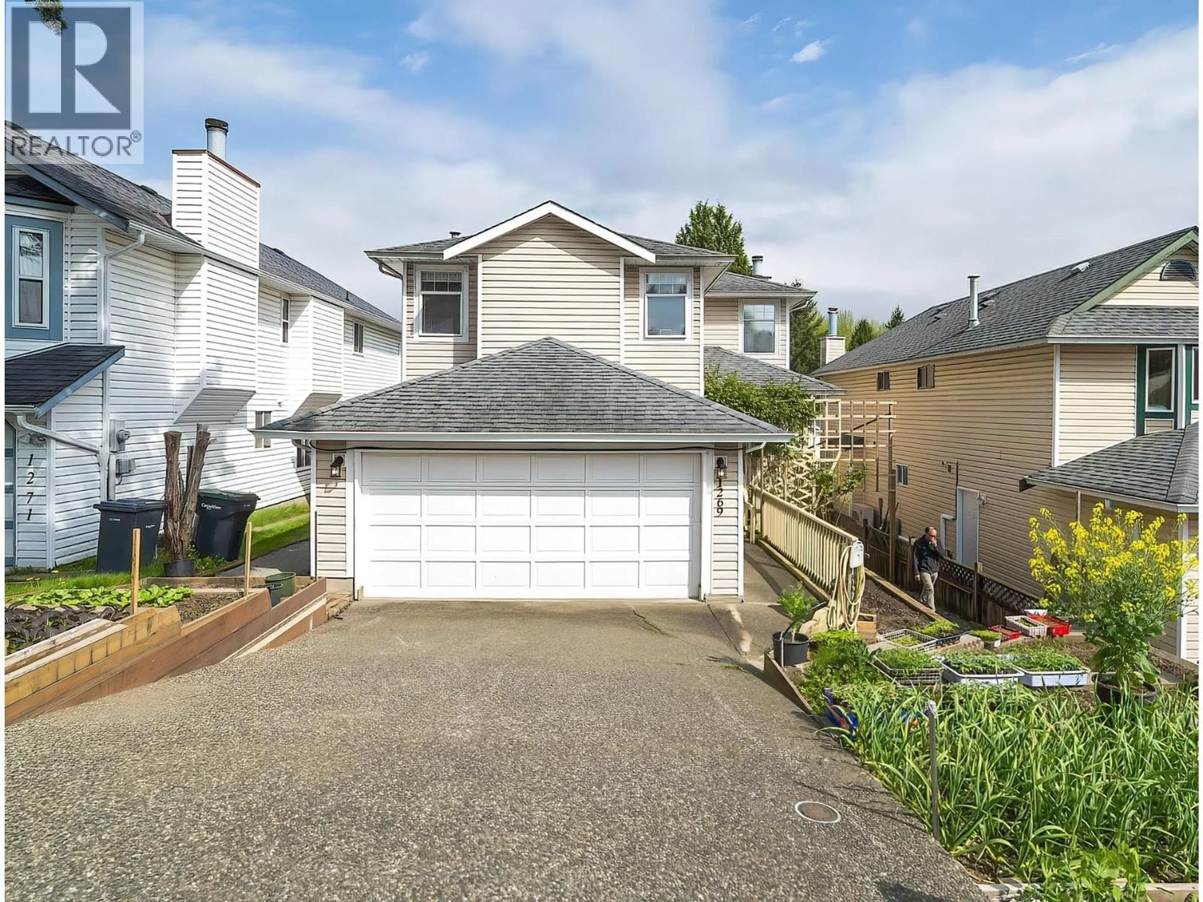 Home with vinyl exterior material, street for 1269 MICHIGAN DRIVE, Coquitlam British Columbia V3B3T7