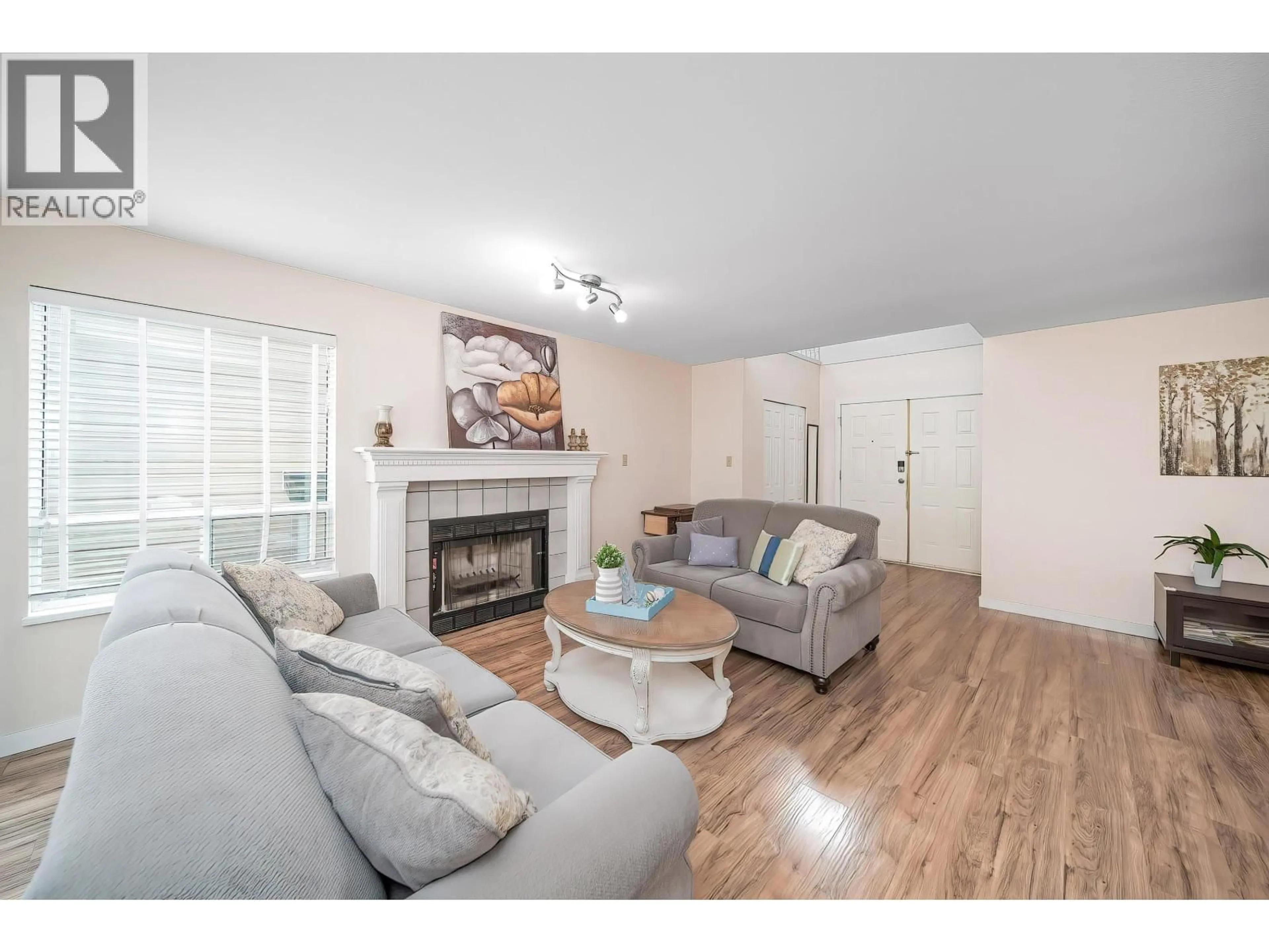 Living room with furniture, wood/laminate floor for 1269 MICHIGAN DRIVE, Coquitlam British Columbia V3B3T7