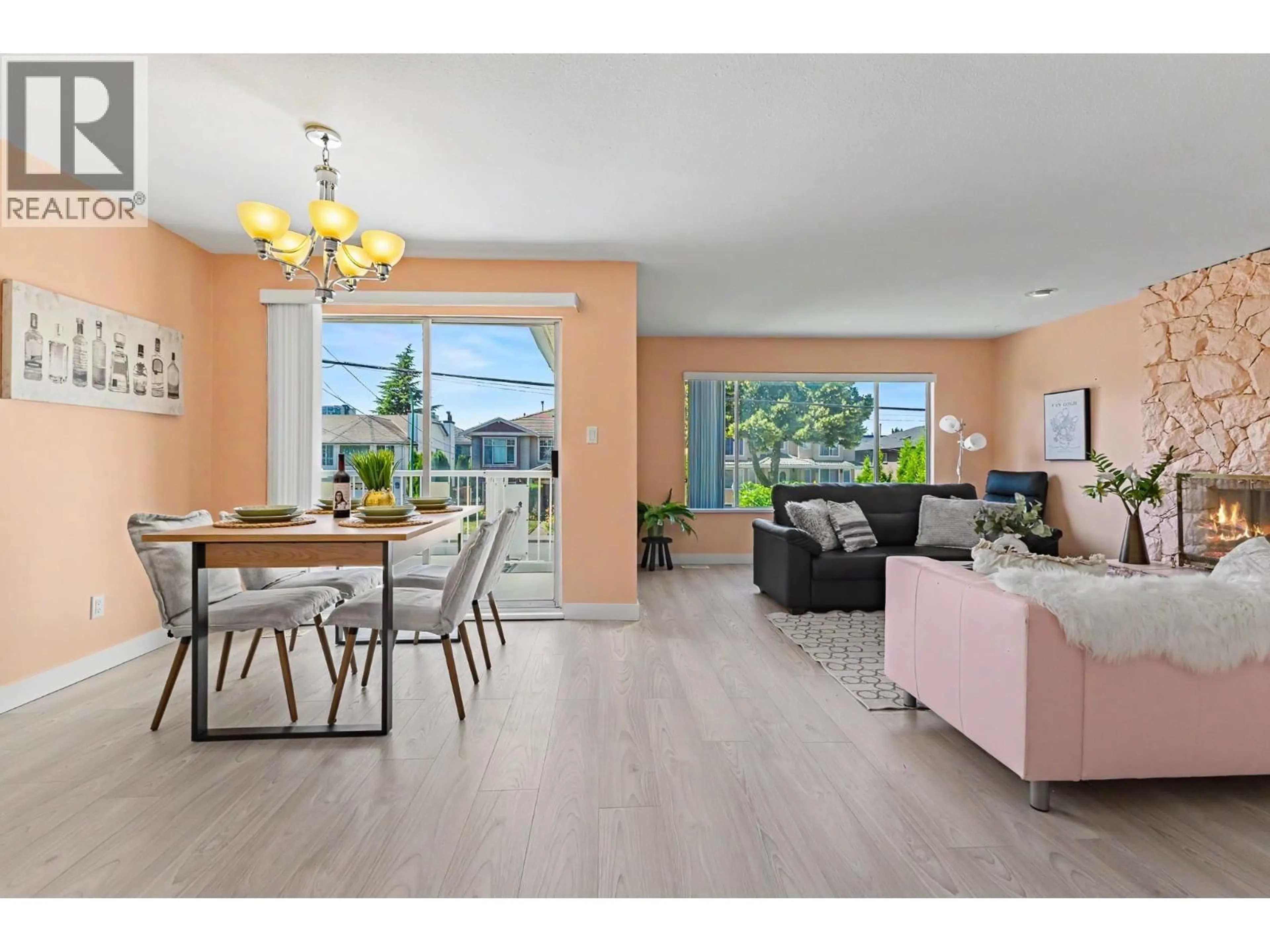 Living room with furniture, wood/laminate floor for 7622 17TH AVENUE, Burnaby British Columbia V3N1L7
