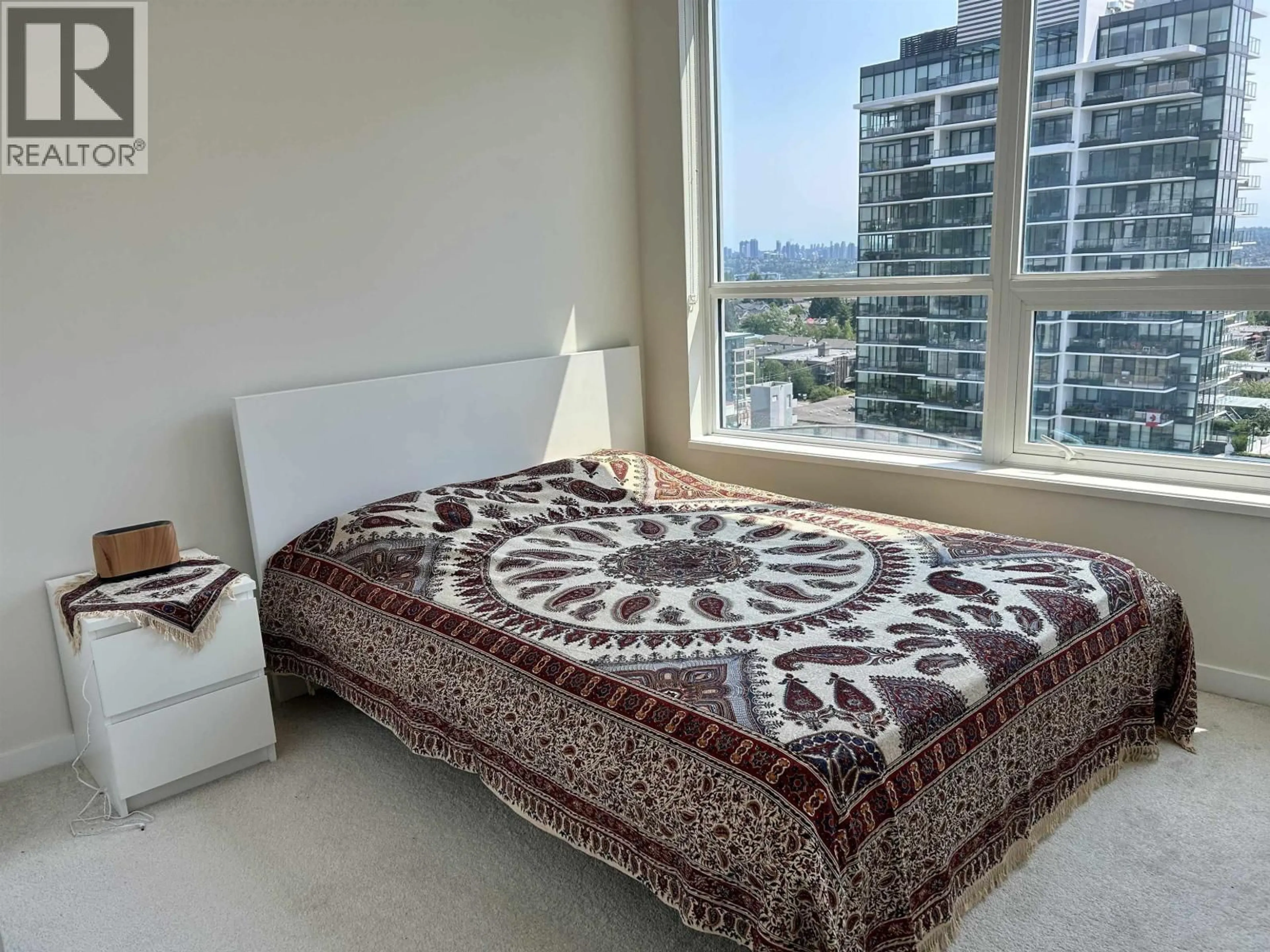 Bedroom with bed, carpet floor for 1403 - 125 14TH STREET, North Vancouver British Columbia V7L0E6