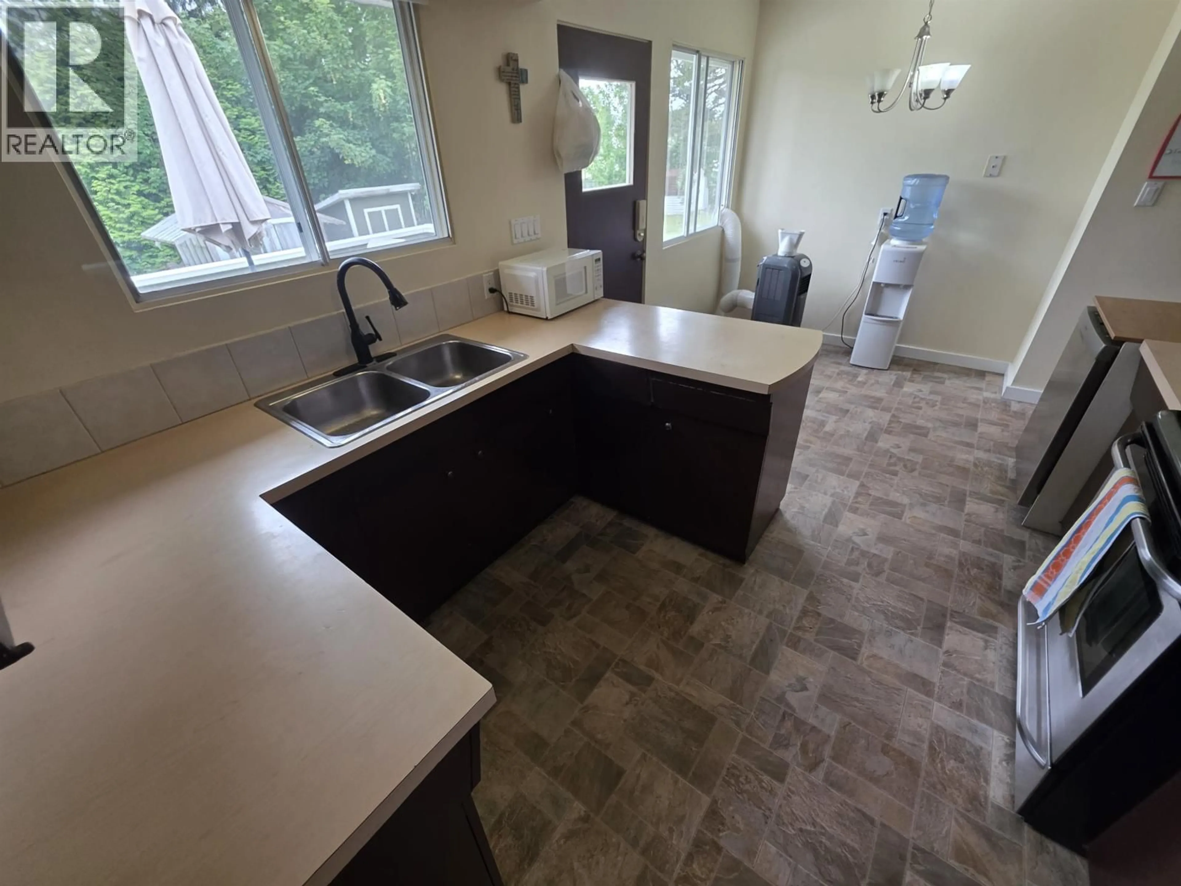 Open concept kitchen, ceramic/tile floor for 4831 OLSON AVENUE, Terrace British Columbia V8G2A5