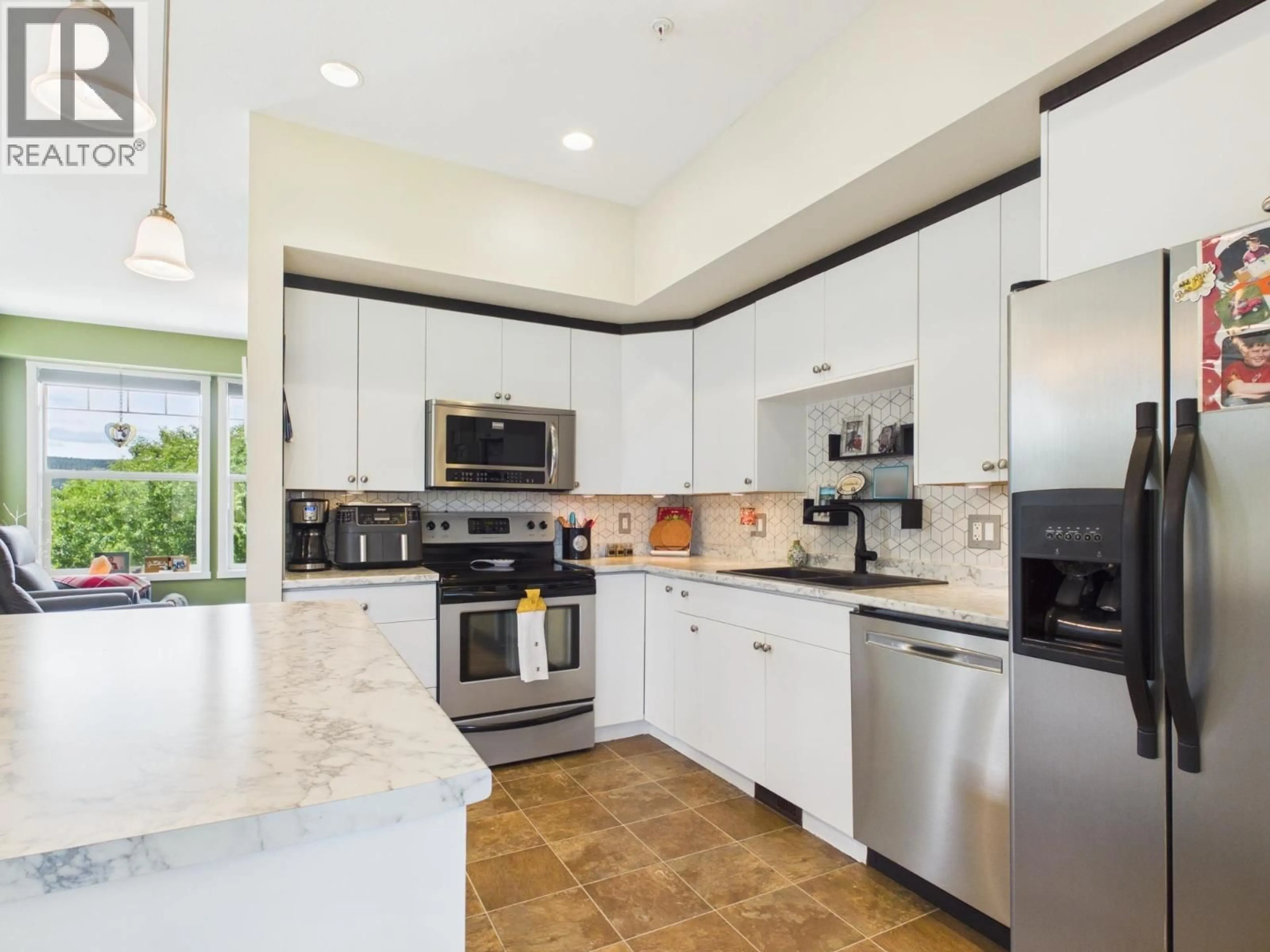 Open concept kitchen, ceramic/tile floor for 1 - 1880 HAMEL ROAD, Williams Lake British Columbia V2G0A4