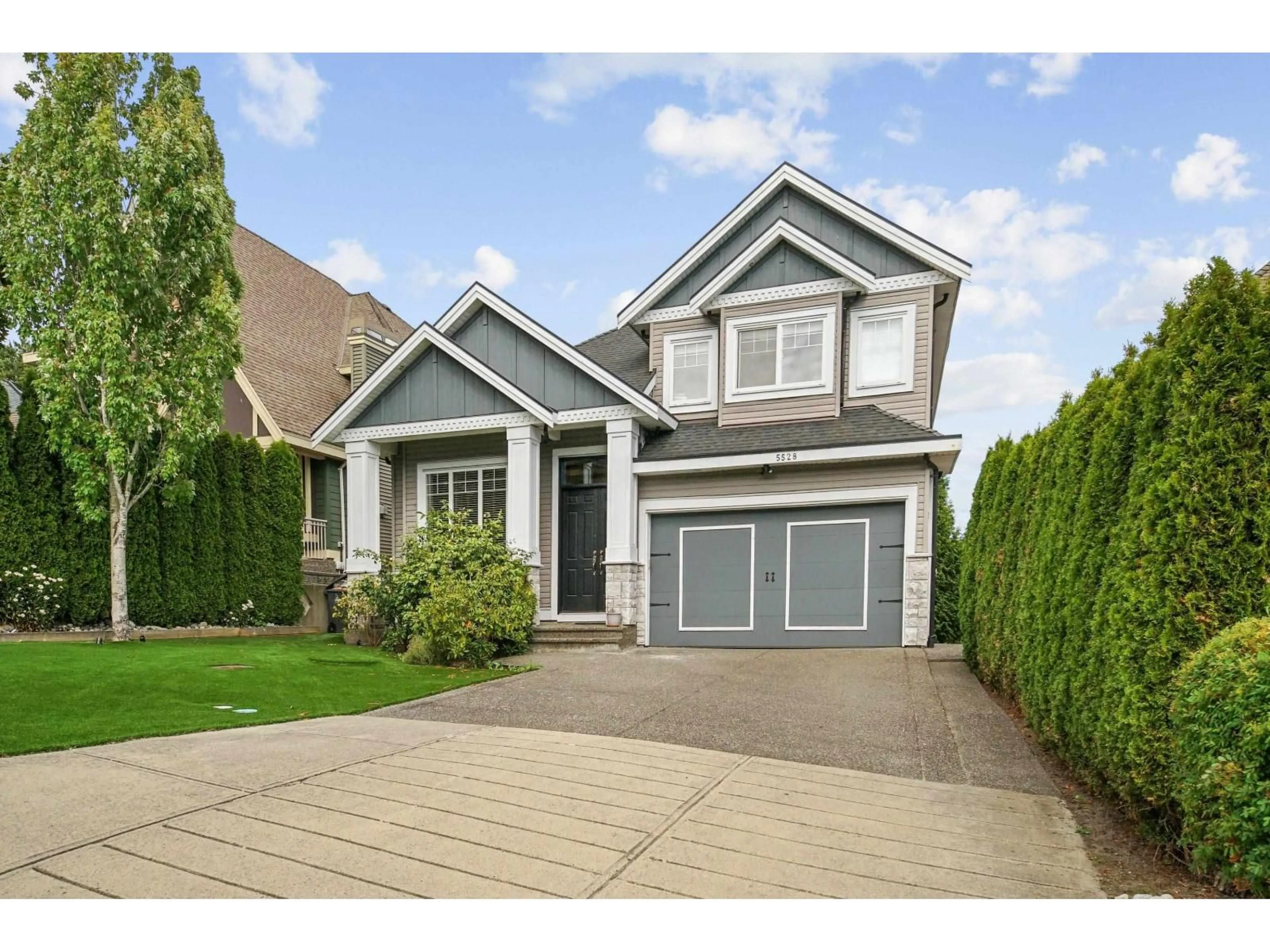 Home with vinyl exterior material, street for 5528 189A STREET, Surrey British Columbia V3S6X1