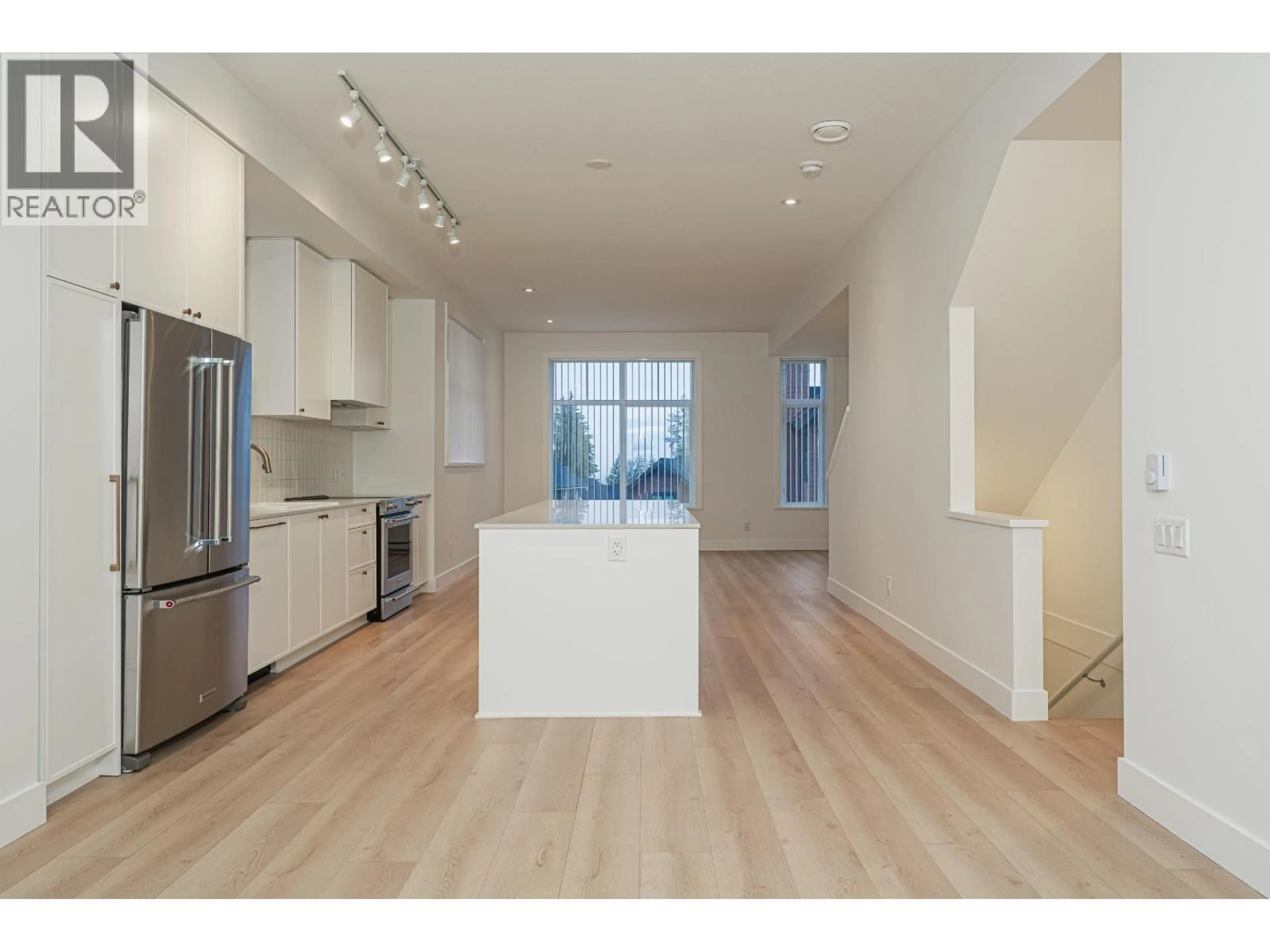 Open concept kitchen, wood/laminate floor for 173 - 1331 OLMSTED STREET, Coquitlam British Columbia V3E0T3