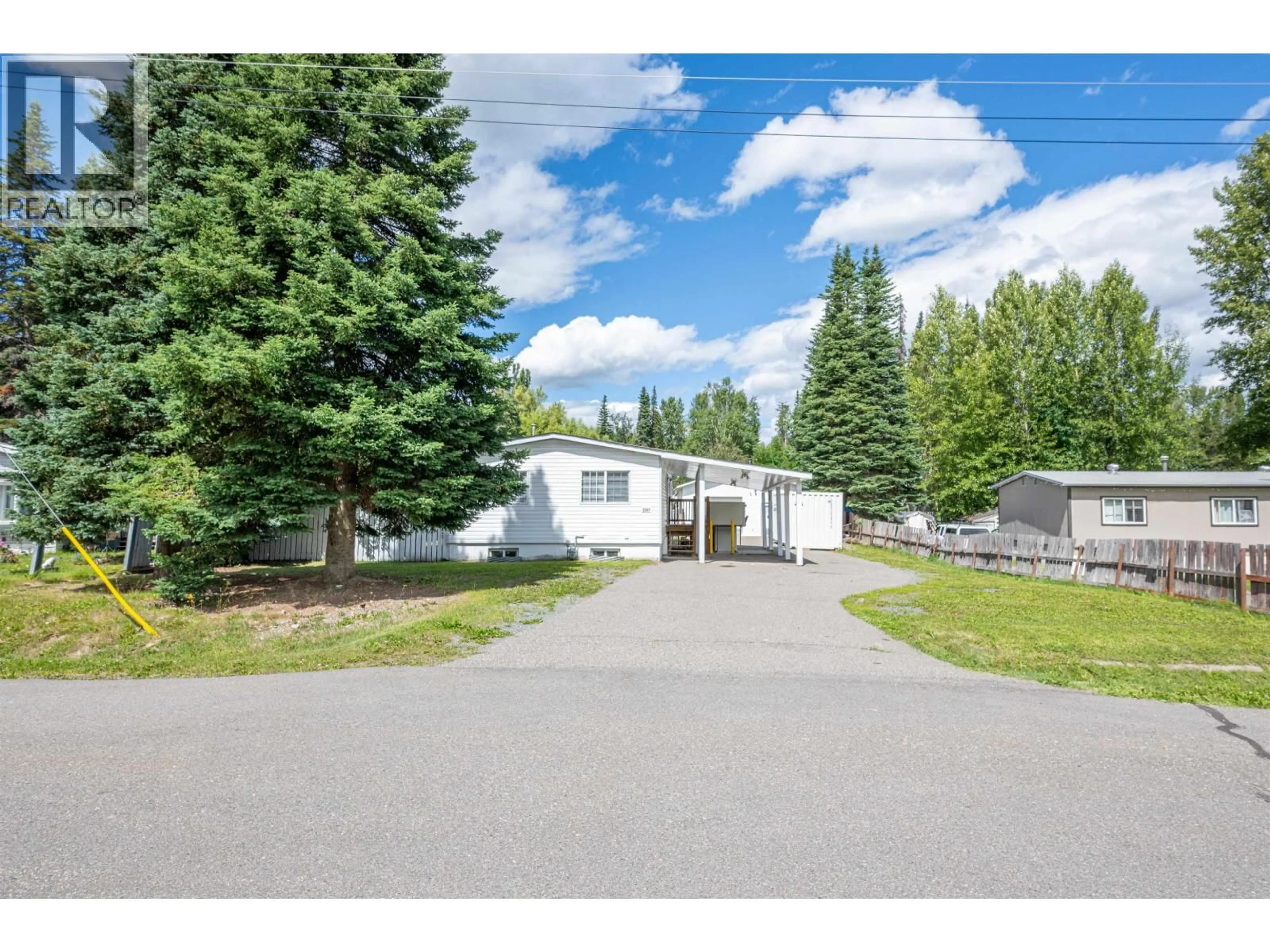 A pic from outside/outdoor area/front of a property/back of a property/a pic from drone, unknown for 7167 KENNEDY CRESCENT, Prince George British Columbia V2K2P9