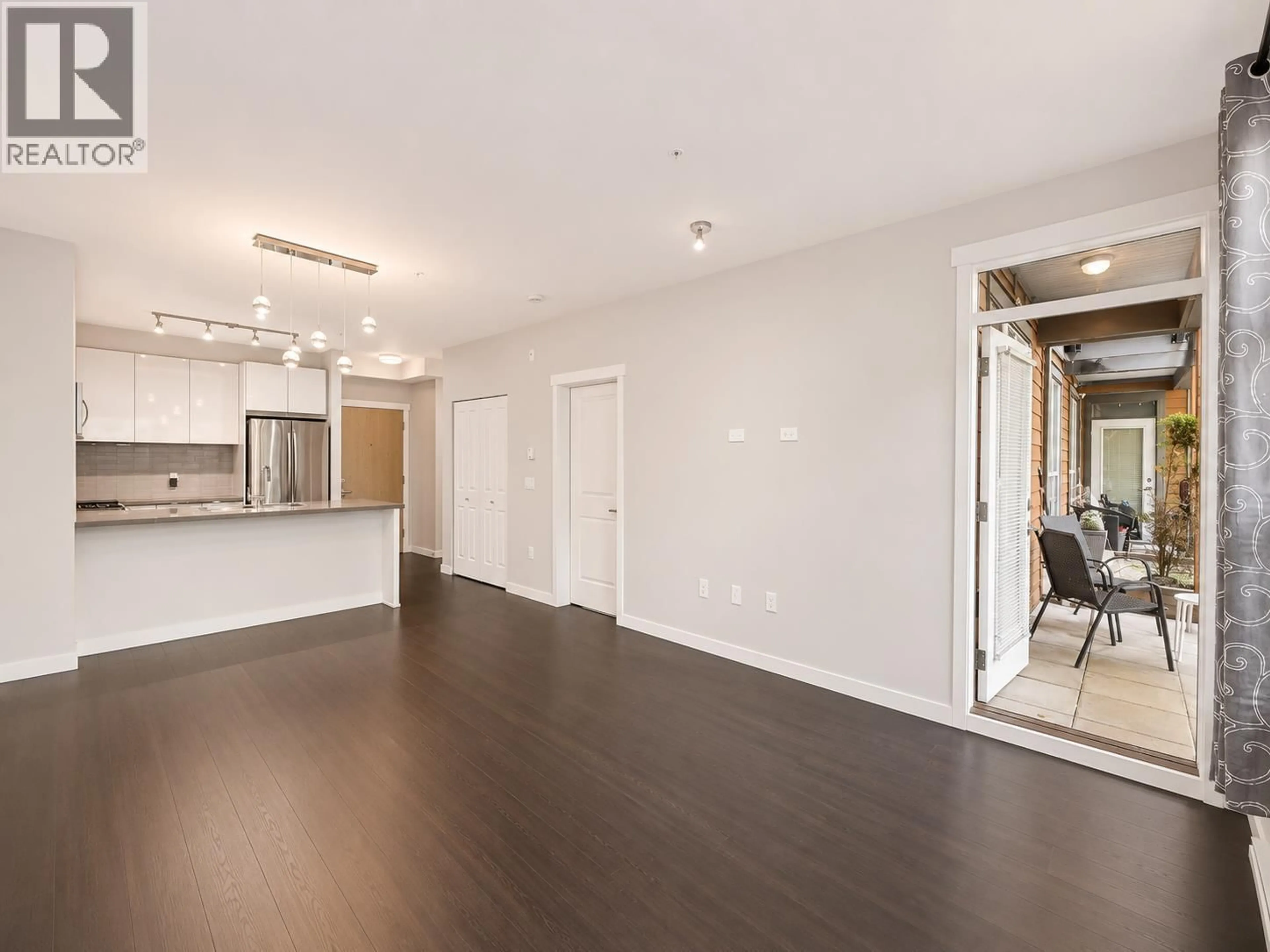 Open concept kitchen, wood/laminate floor for 108 - 607 COTTONWOOD AVENUE, Coquitlam British Columbia V3J0H1