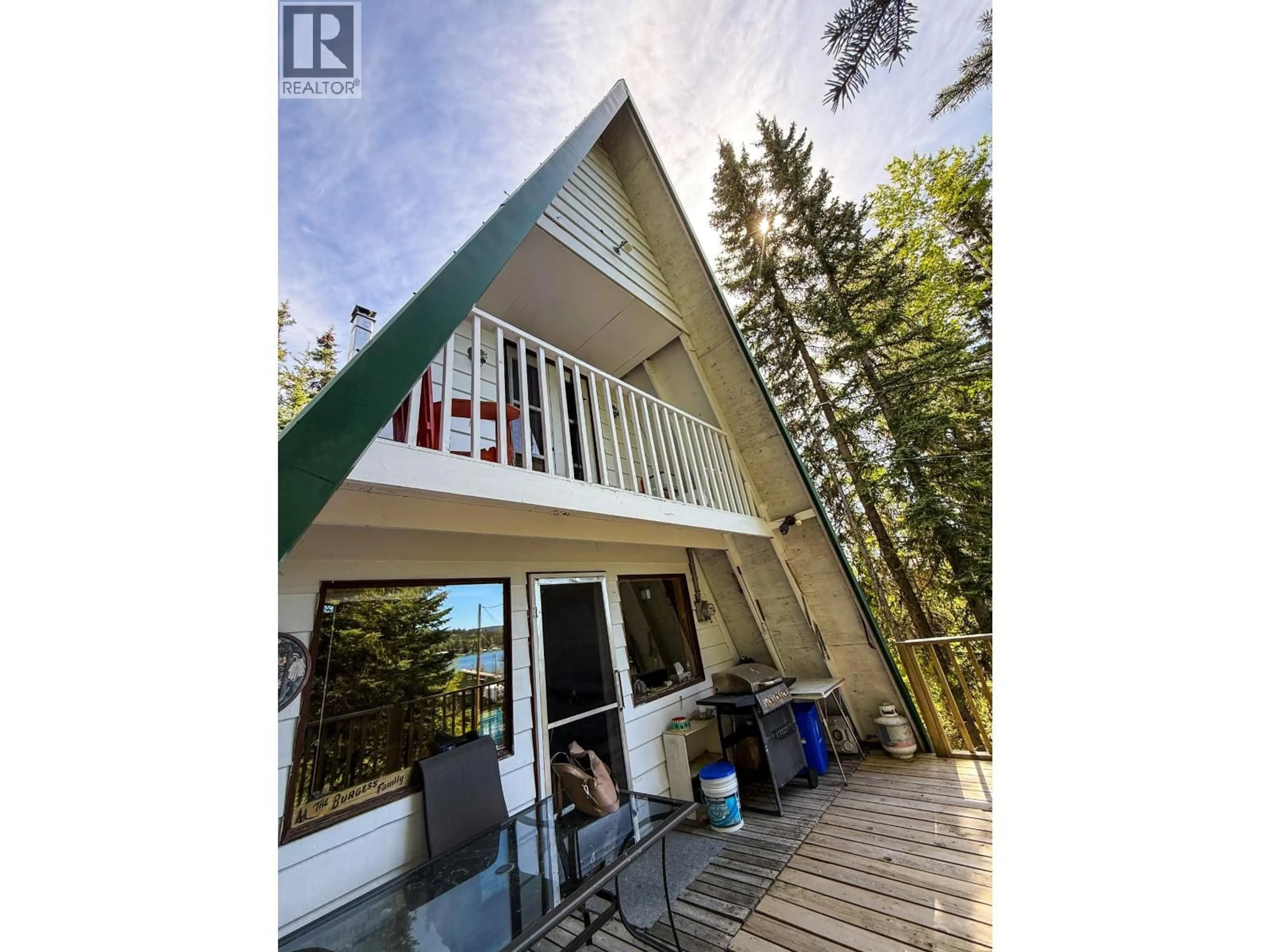 A pic from outside/outdoor area/front of a property/back of a property/a pic from drone, water/lake/river/ocean view for 7582 BEAZELY ROAD, Deka Lake / Sulphurous / Hathaway Lakes British Columbia V0K1X3