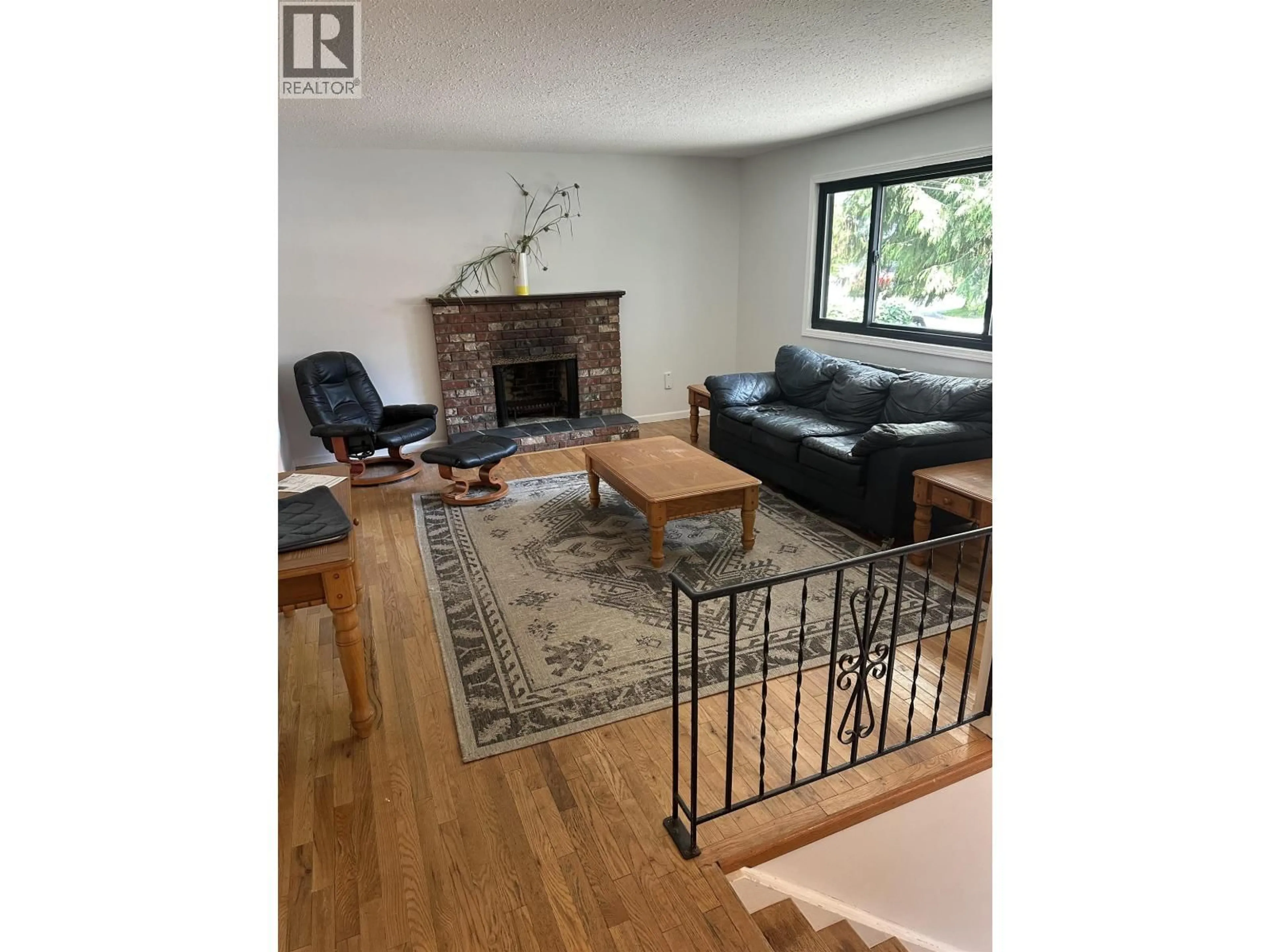 Living room with furniture, wood/laminate floor for 3821 CLEMATIS CRESCENT, Port Coquitlam British Columbia V3B4A9