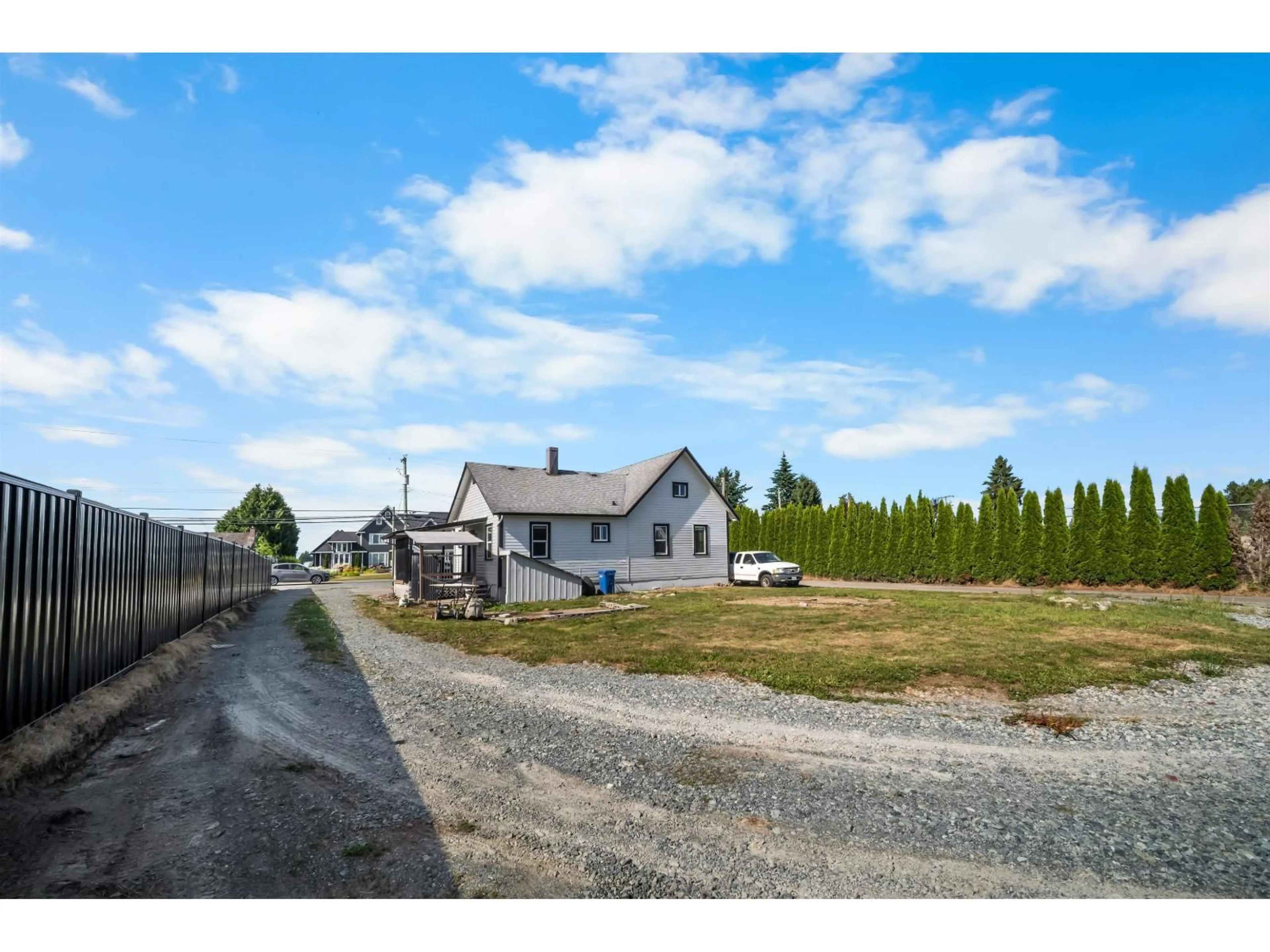 A pic from outside/outdoor area/front of a property/back of a property/a pic from drone, street for 33508 HUNTINGDON ROAD, Abbotsford British Columbia V2S7Z5
