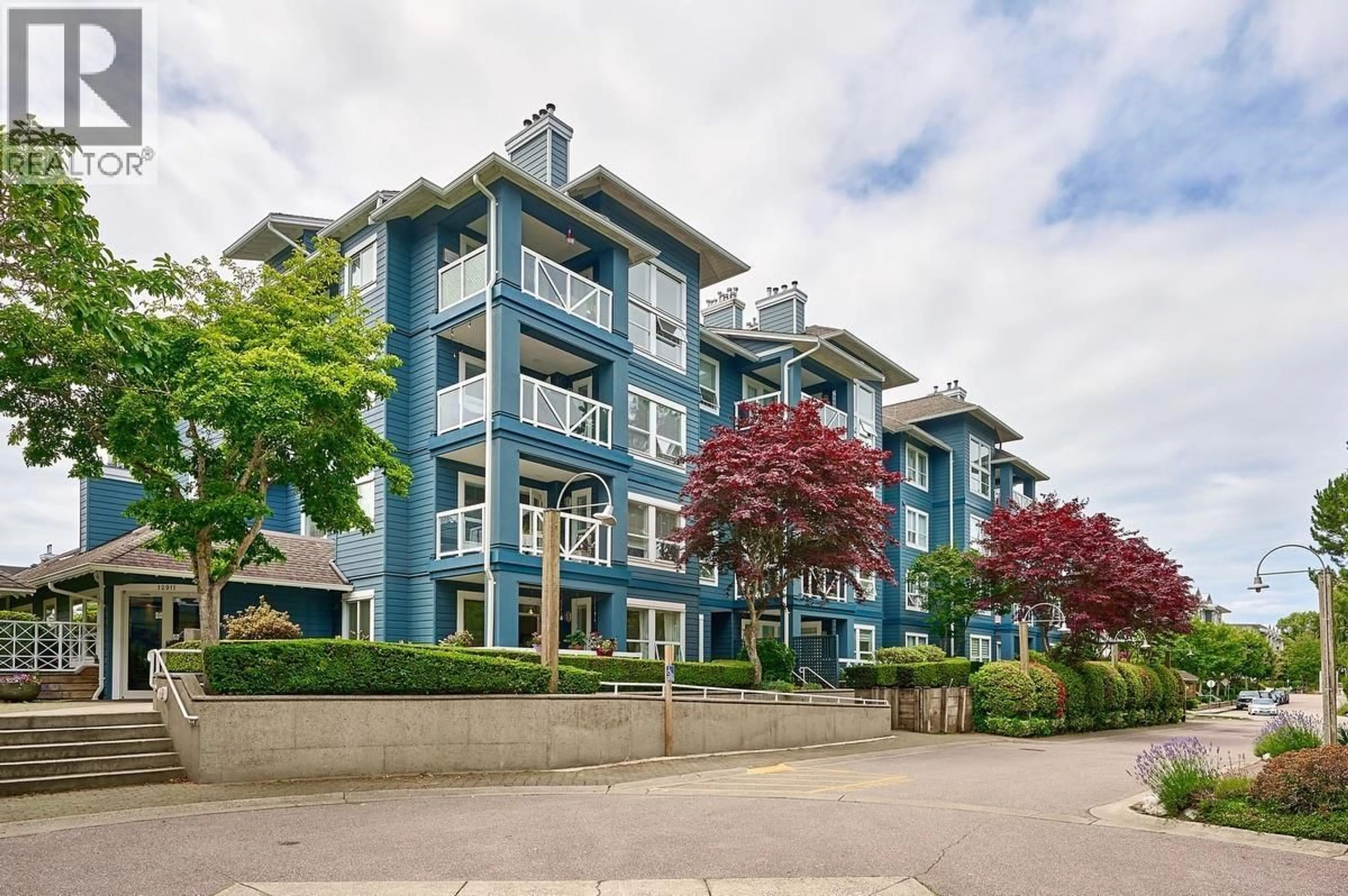 A pic from outside/outdoor area/front of a property/back of a property/a pic from drone, building for 211 - 12911 RAILWAY AVENUE, Richmond British Columbia V7E6L8