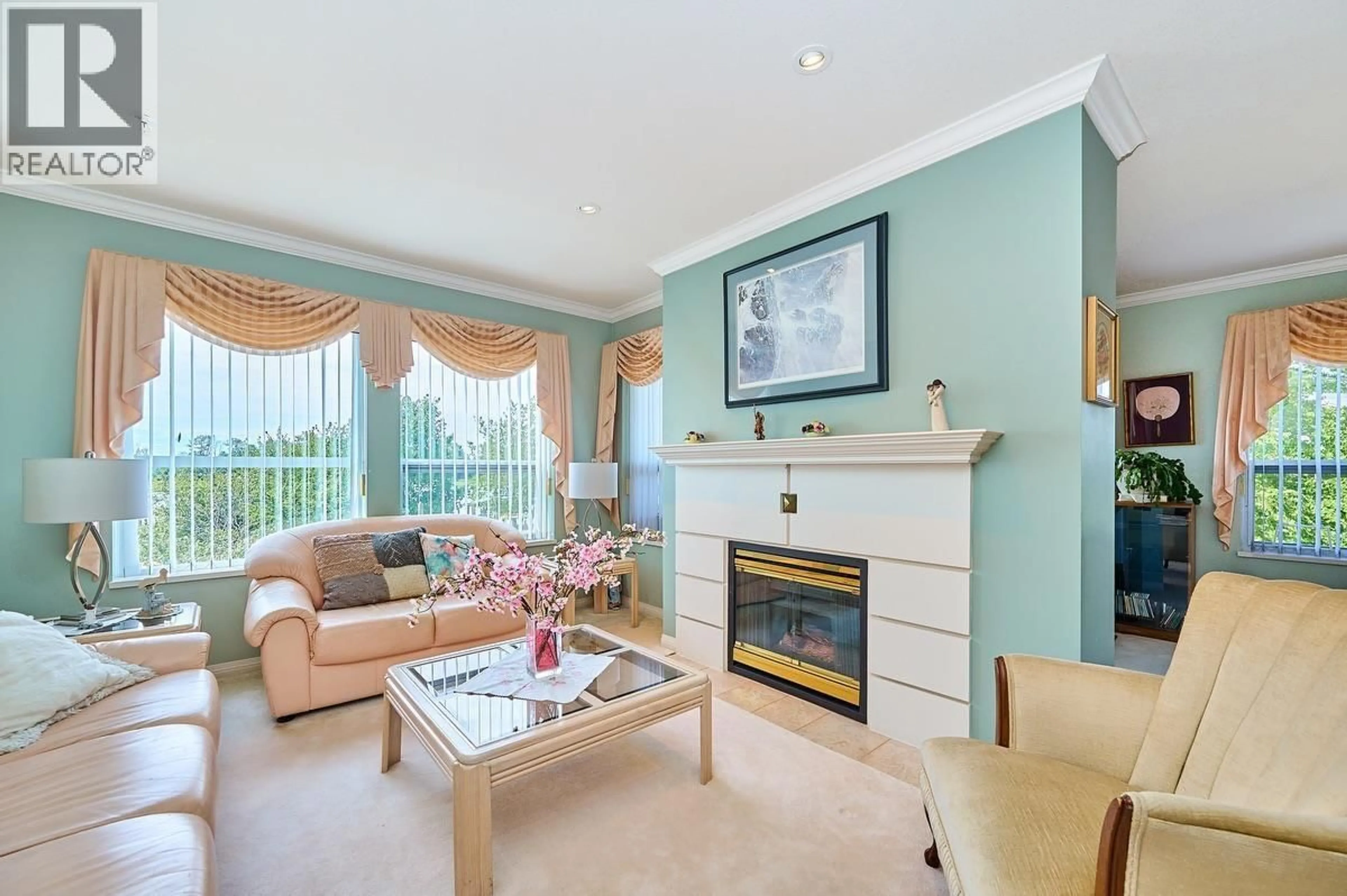 Living room with furniture, wood/laminate floor for 211 - 12911 RAILWAY AVENUE, Richmond British Columbia V7E6L8