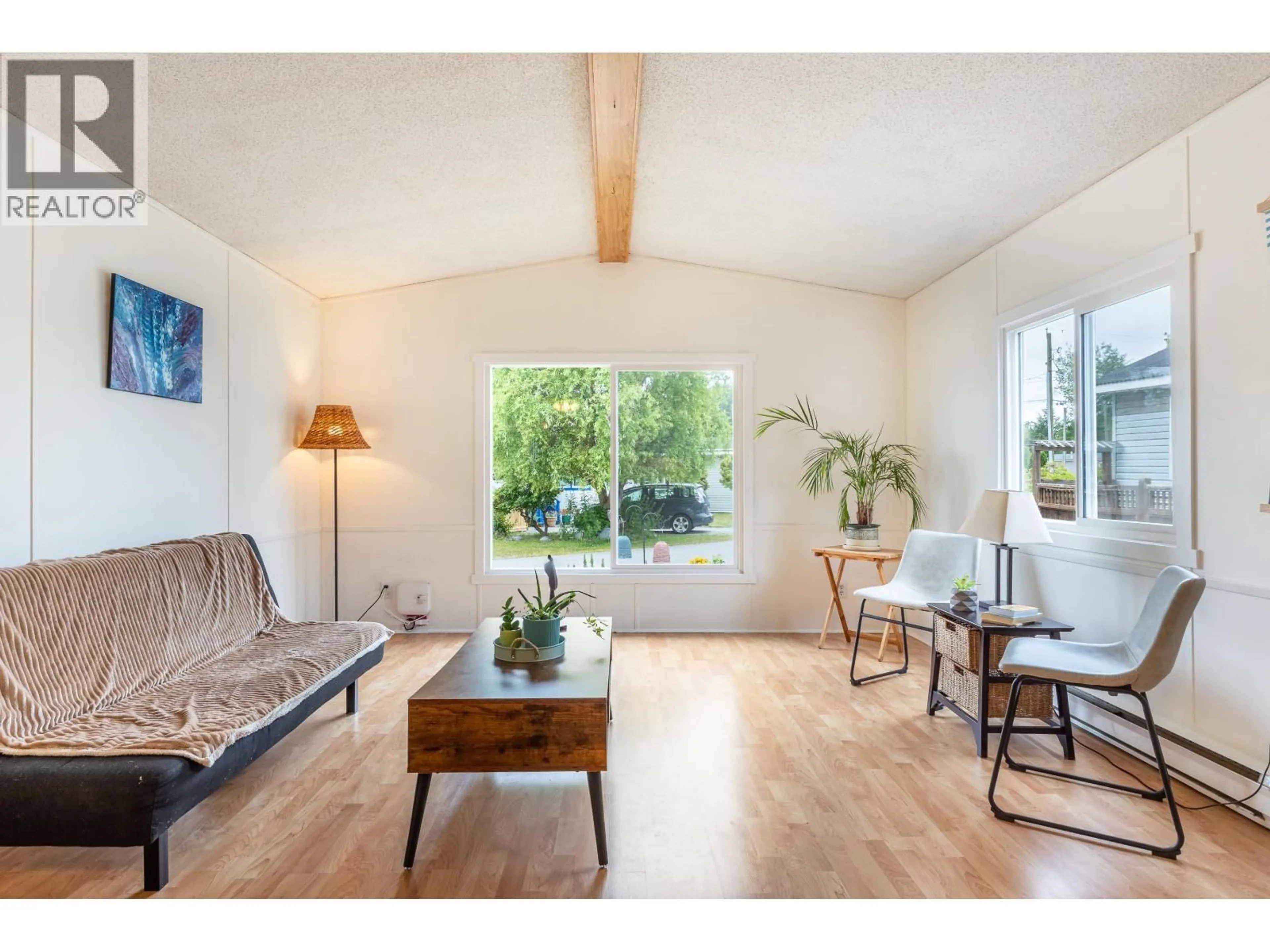 Living room with furniture, wood/laminate floor for 53 - 1413 SUNSHINE COAST HIGHWAY, Gibsons British Columbia V0N1V5