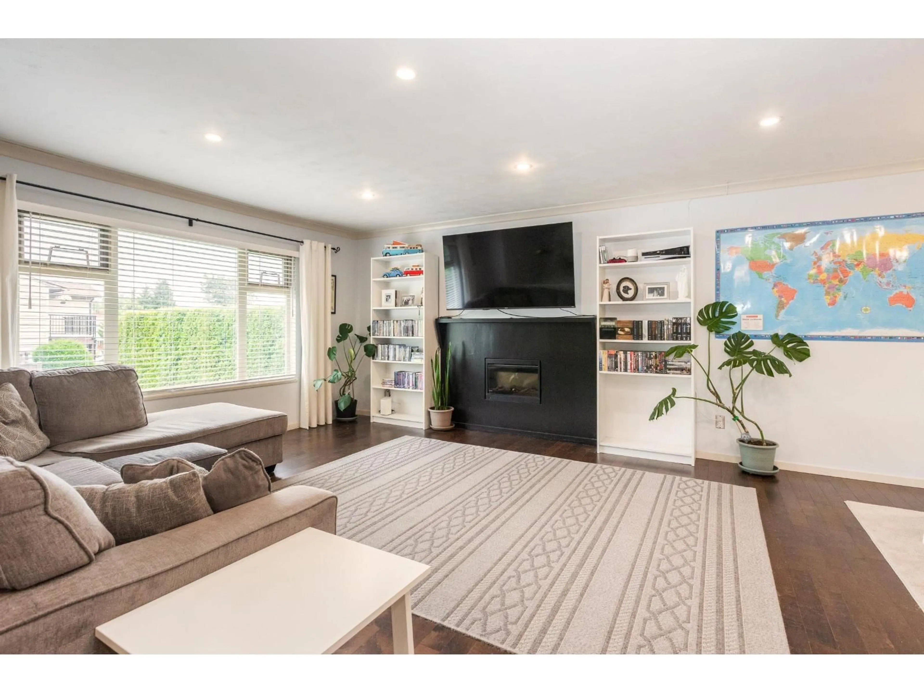 Living room with furniture, wood/laminate floor for 26481 30A AVENUE, Langley British Columbia V4W3E1