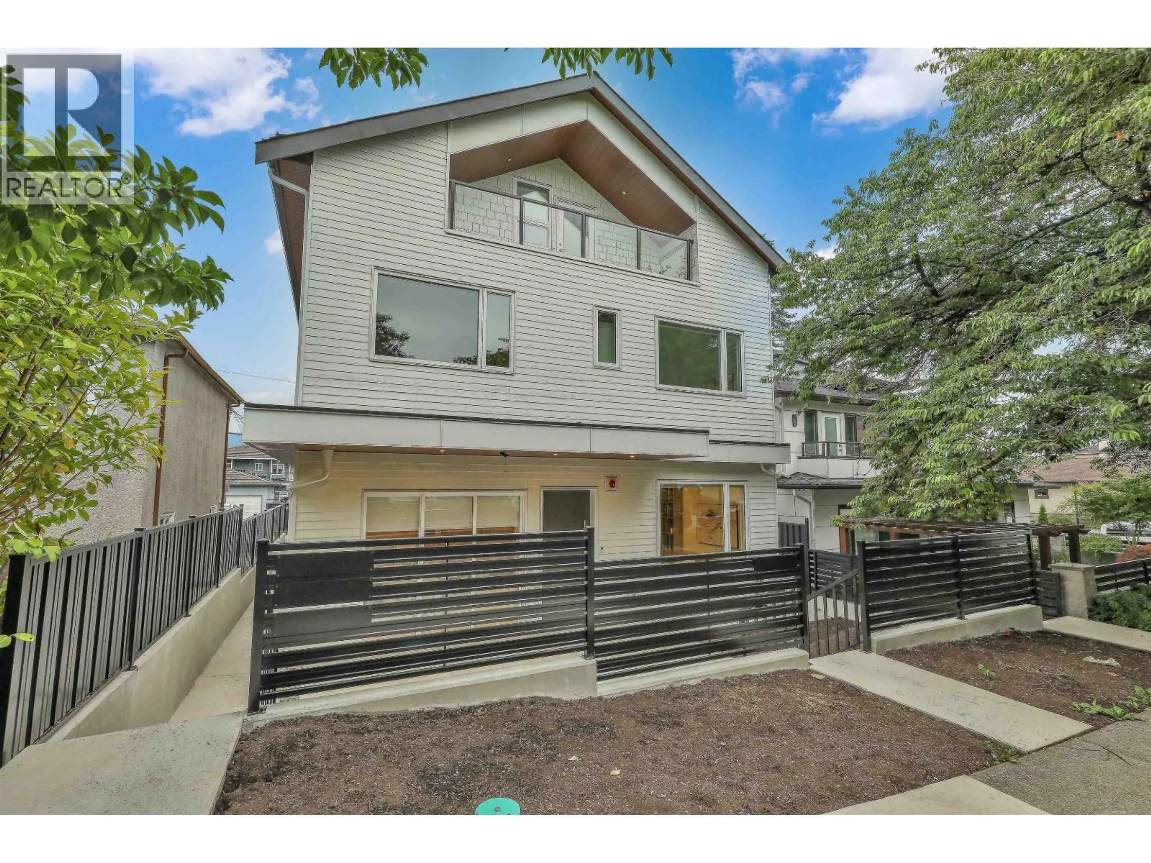 Home with brick exterior material, street for 1 - 3185 GRAVELEY STREET, Vancouver British Columbia V5K3K7