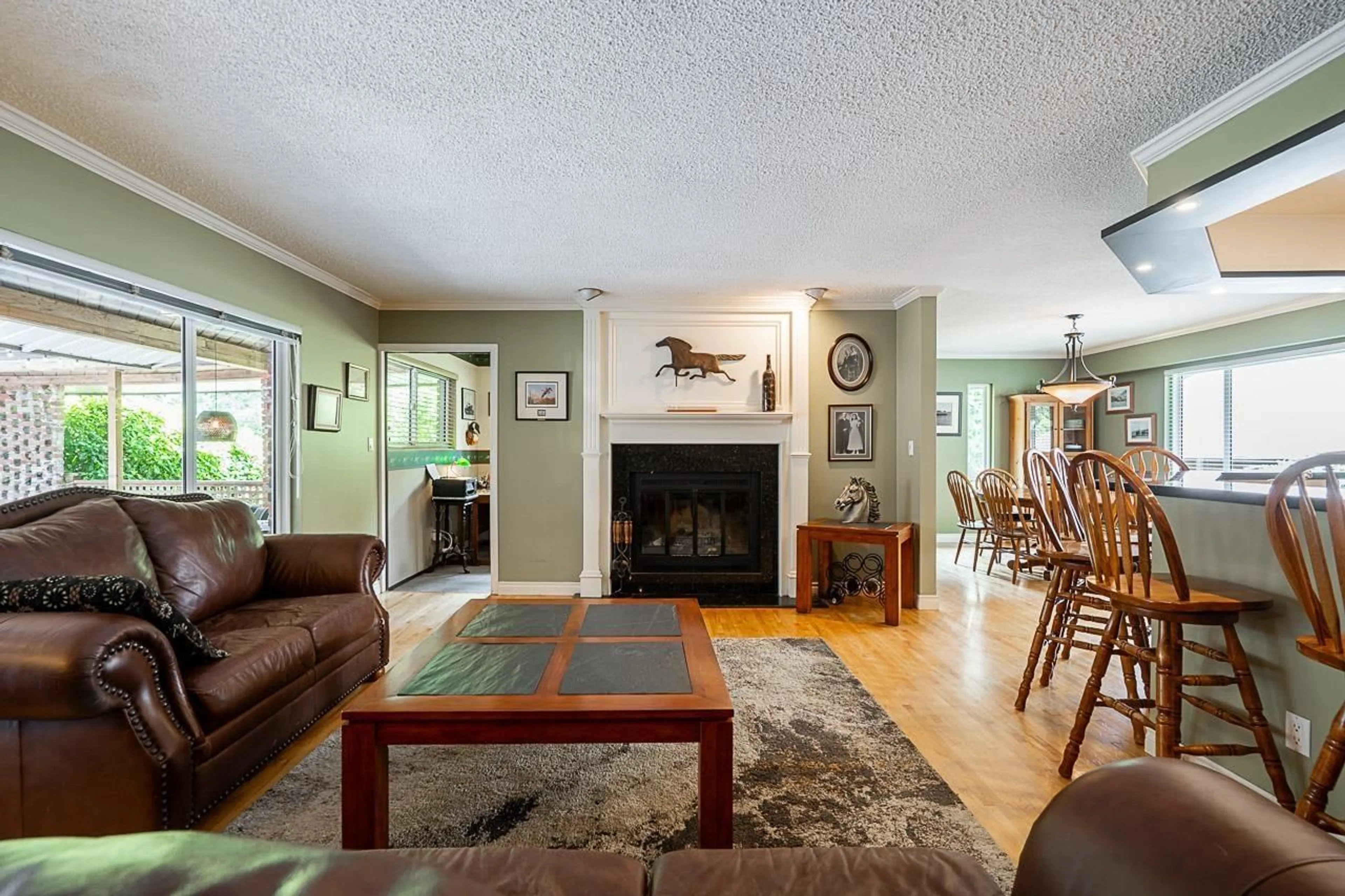Living room with furniture, wood/laminate floor for 13937 35A AVENUE, Surrey British Columbia V4P1L2