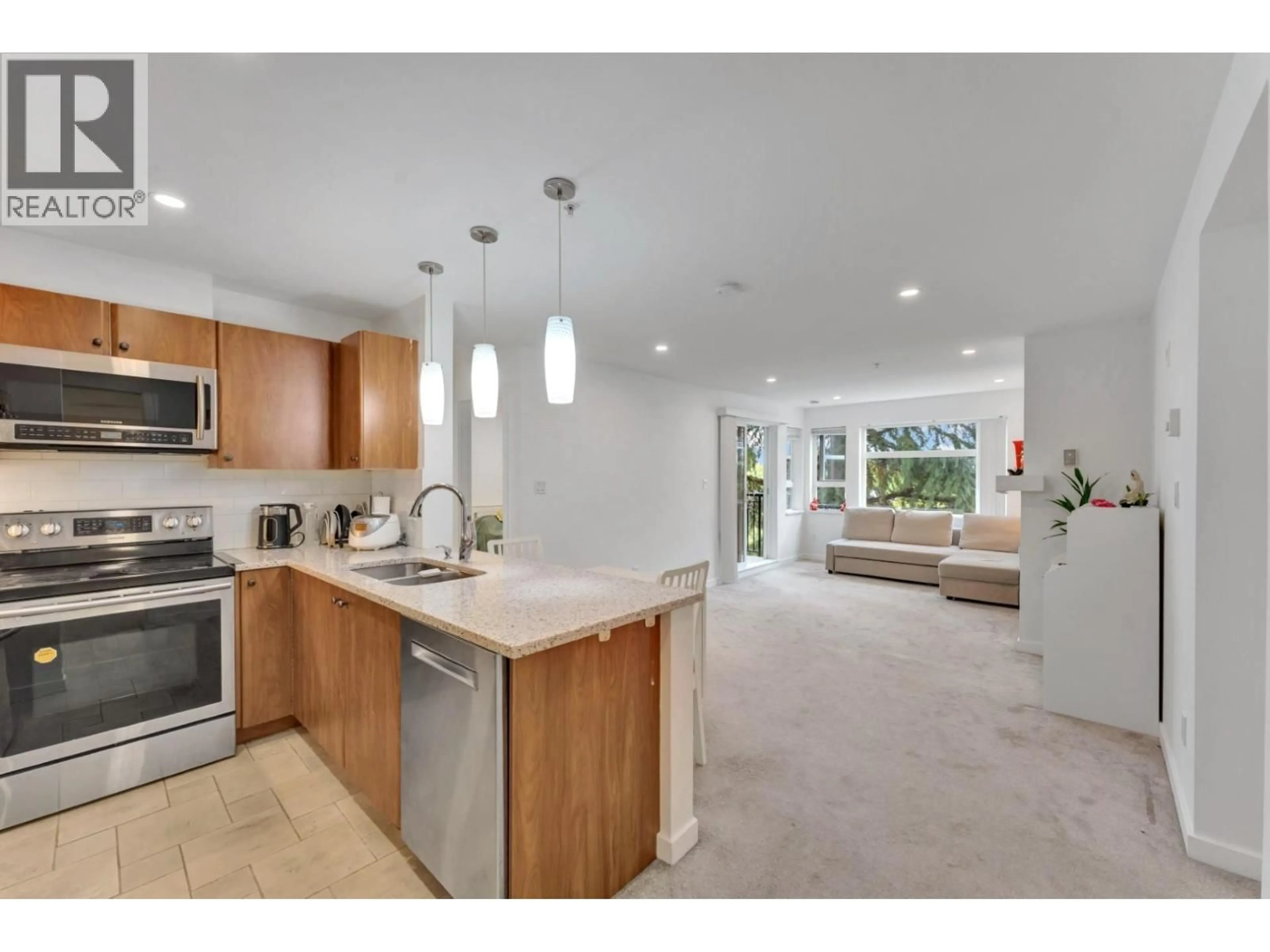 Open concept kitchen, ceramic/tile floor for 320 - 6508 DENBIGH AVENUE, Burnaby British Columbia V5H4W6