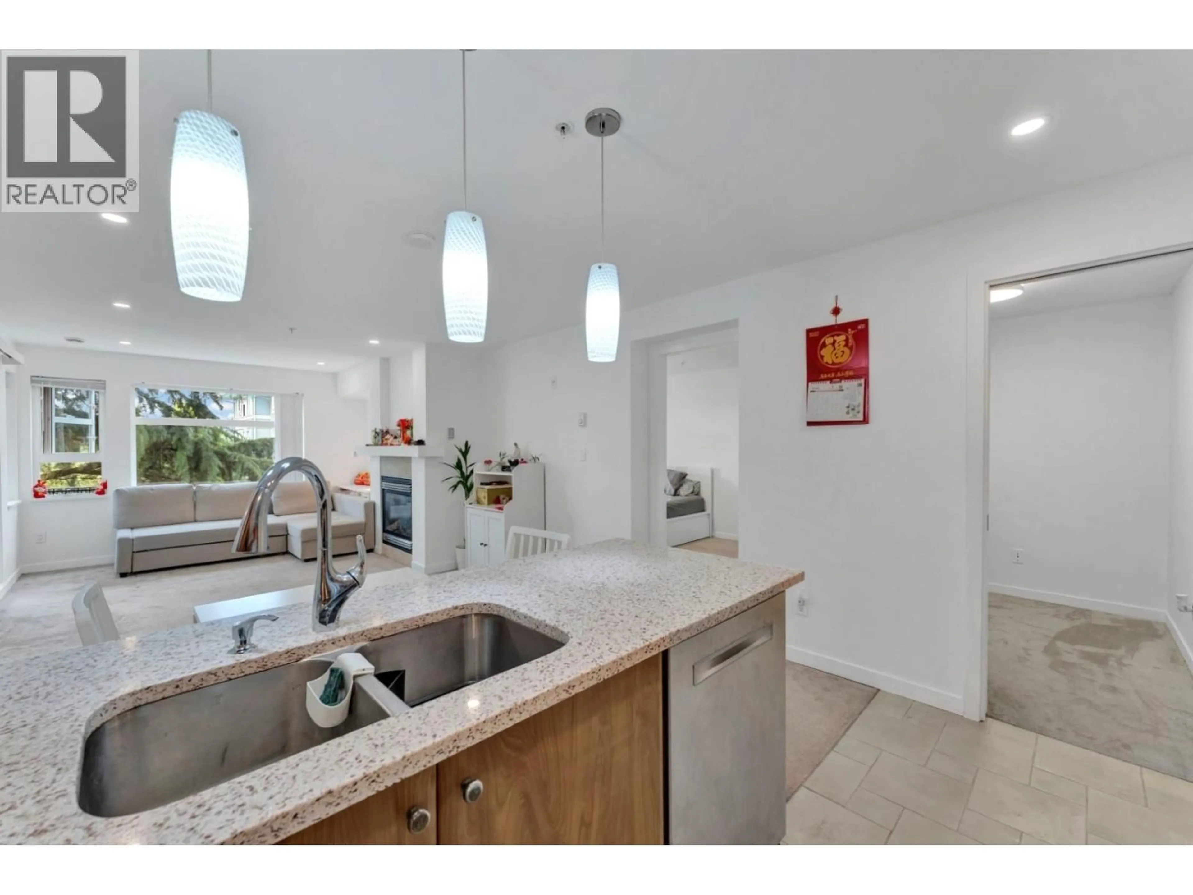 Open concept kitchen, ceramic/tile floor for 320 - 6508 DENBIGH AVENUE, Burnaby British Columbia V5H4W6