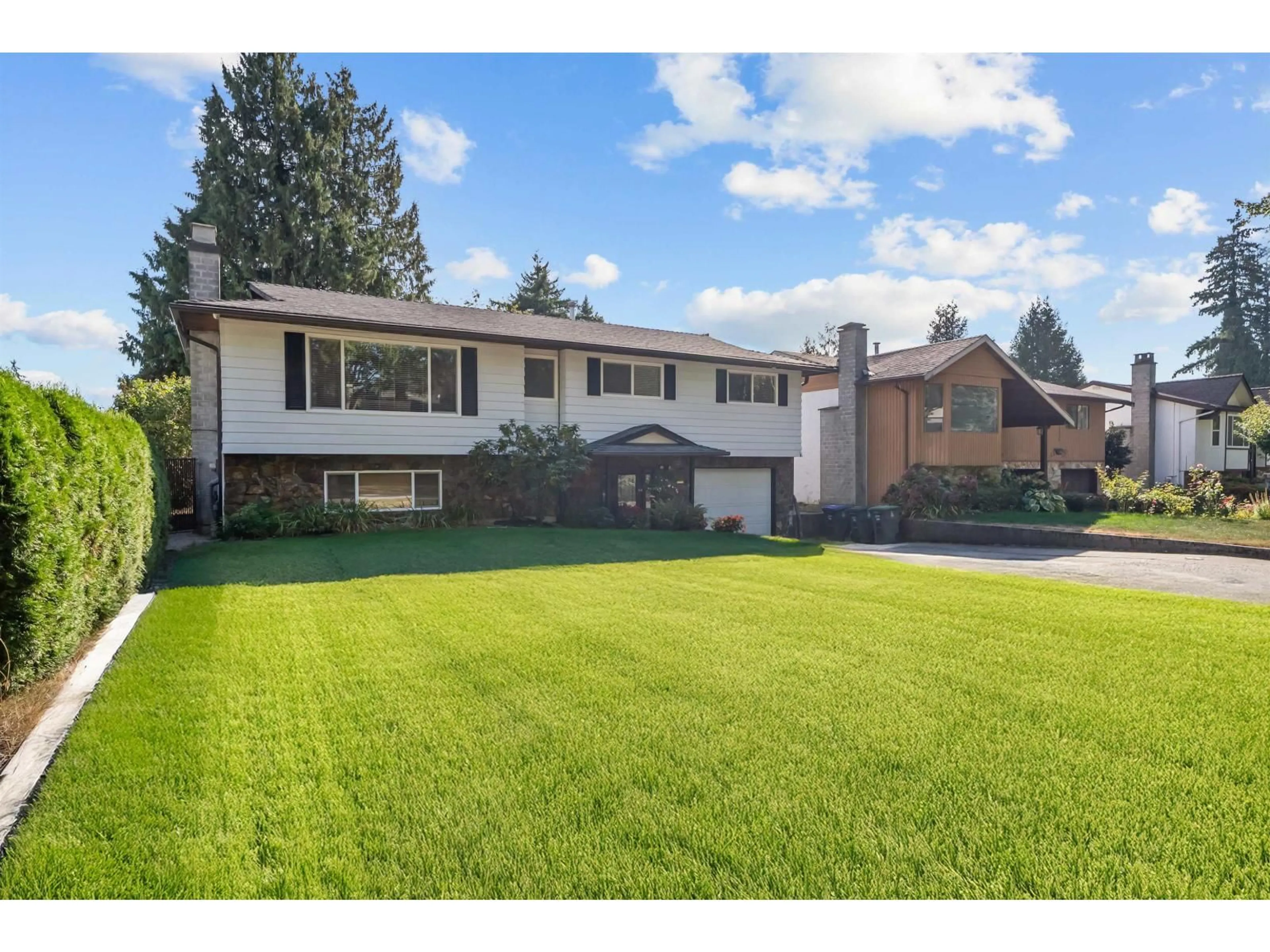 Home with vinyl exterior material, street for 14974 92A AVENUE, Surrey British Columbia V3R7A5