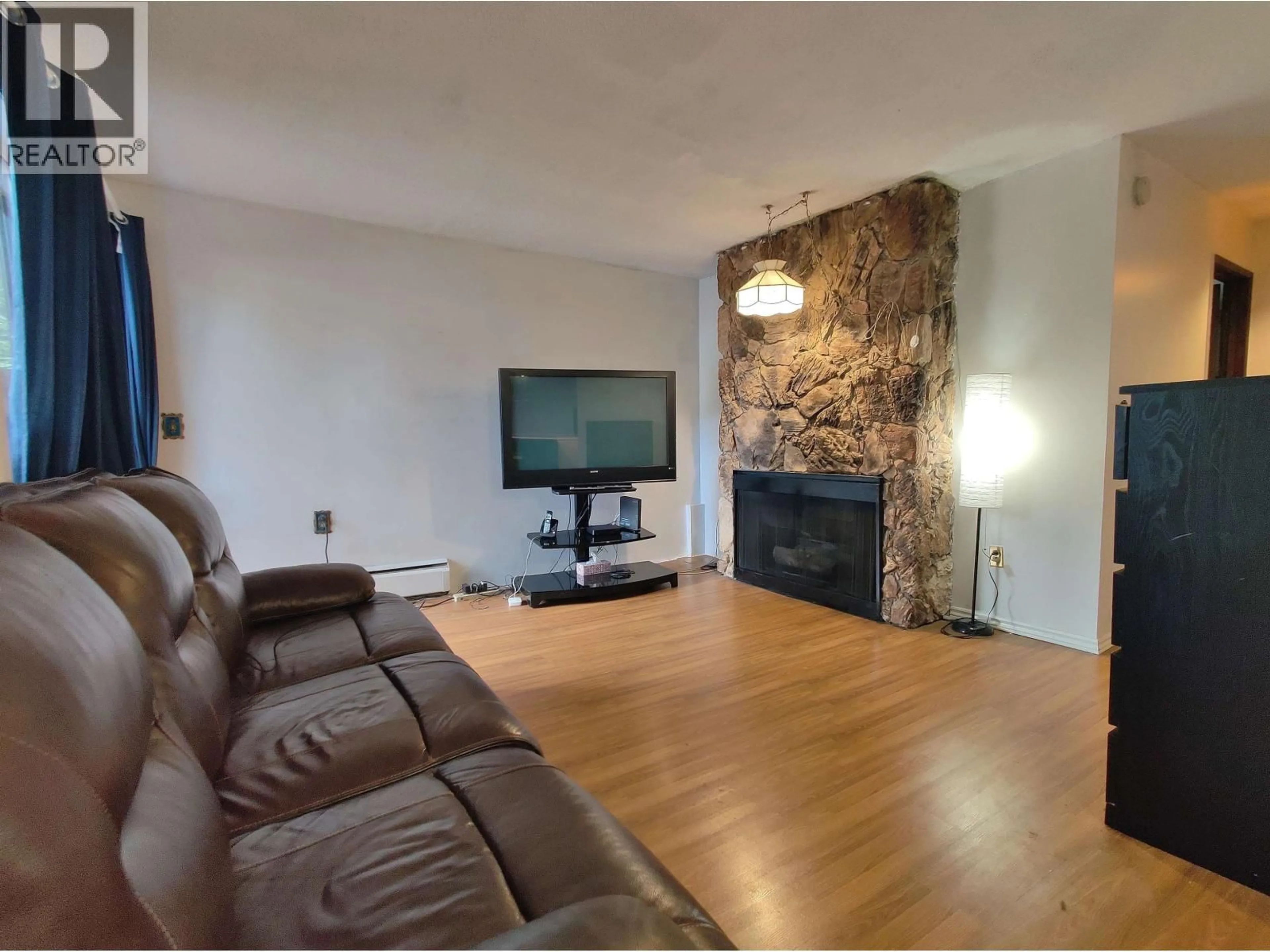 Living room with furniture, wood/laminate floor for 108 - 1420 7TH AVENUE, Vancouver British Columbia V5N1R8