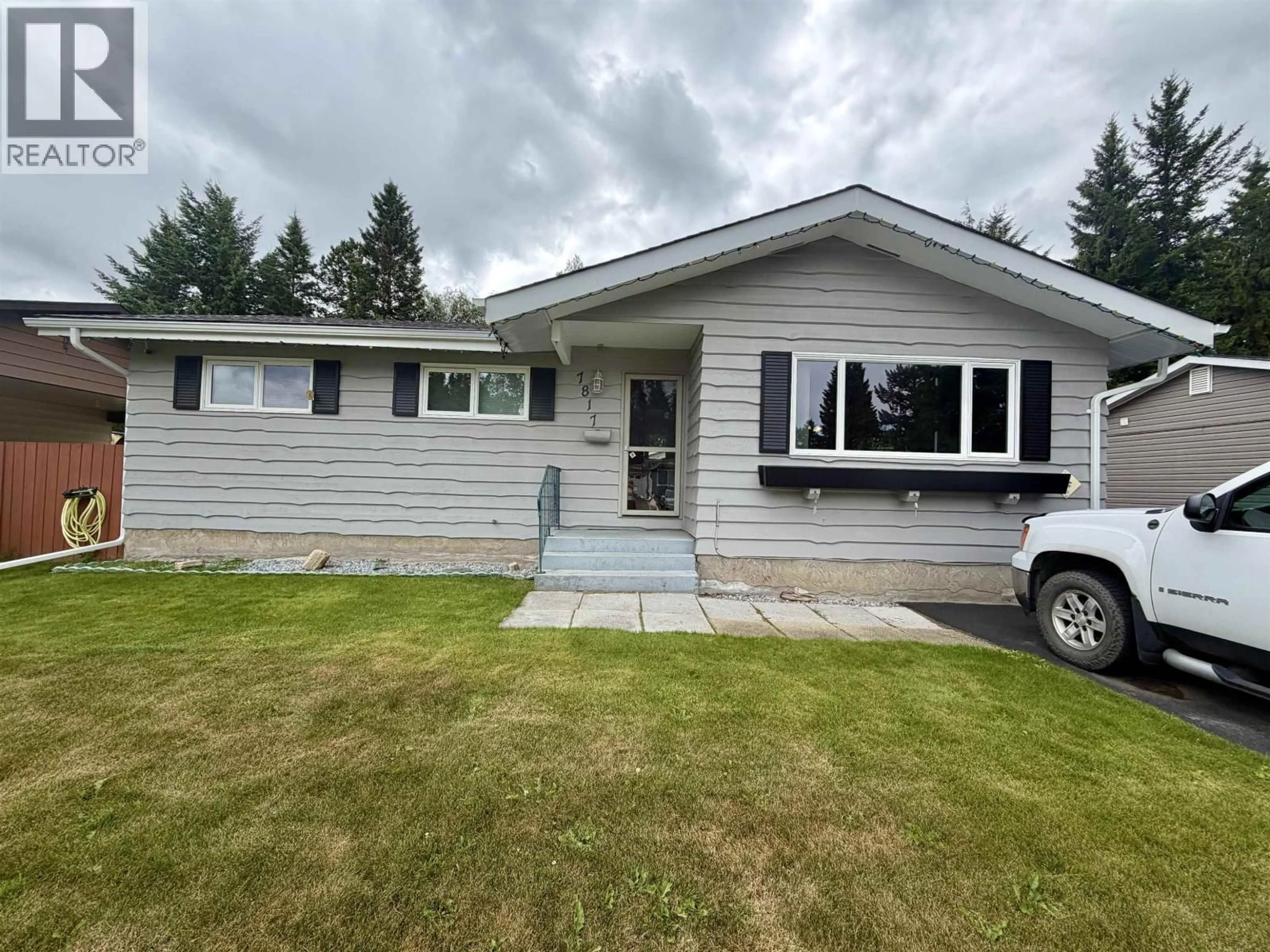 Home with vinyl exterior material, street for 7817 PIEDMONT CRESCENT, Prince George British Columbia V2N3K8