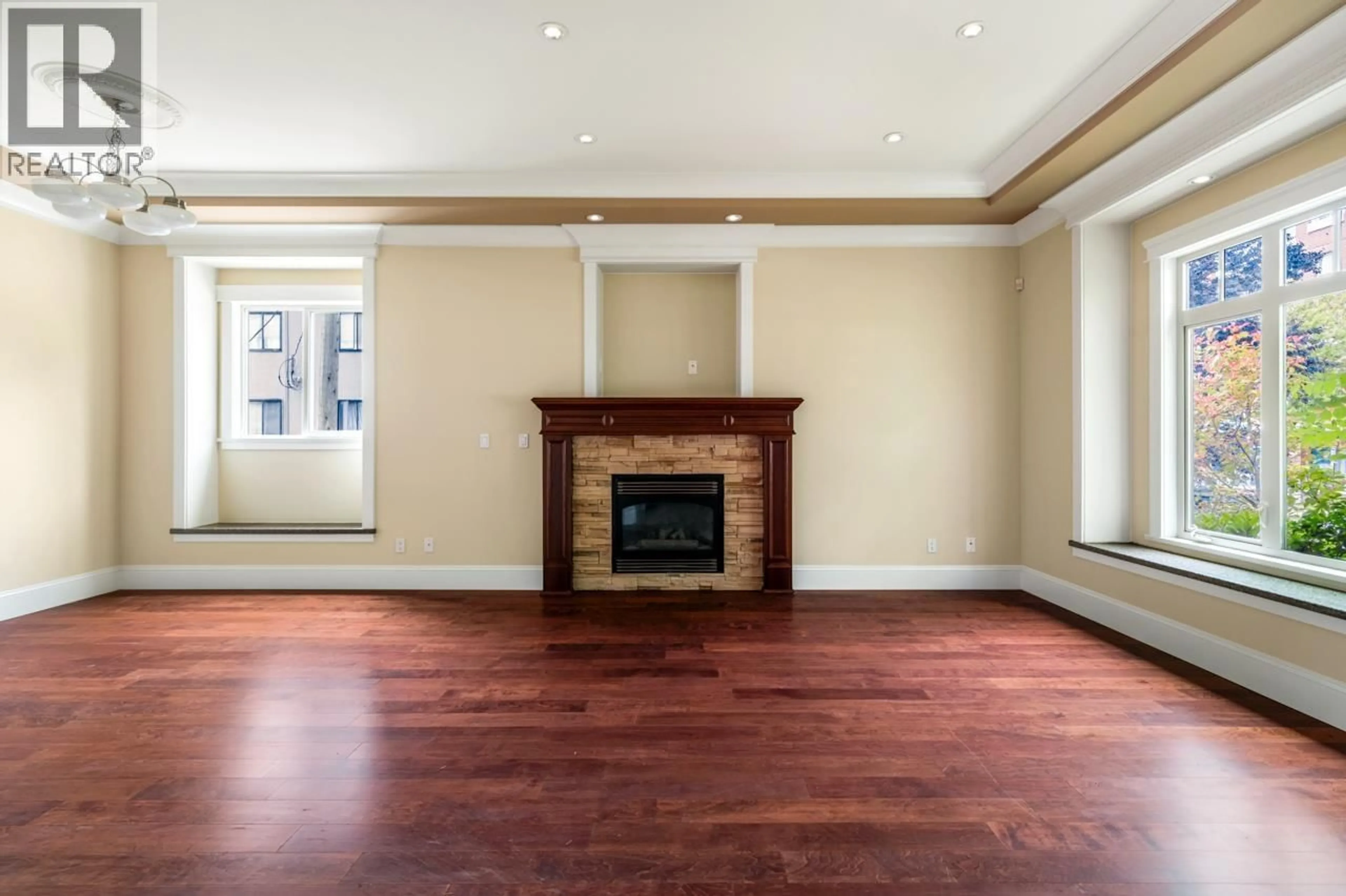 Living room with furniture, wood/laminate floor for 2088 42ND AVENUE, Vancouver British Columbia V6M2B3