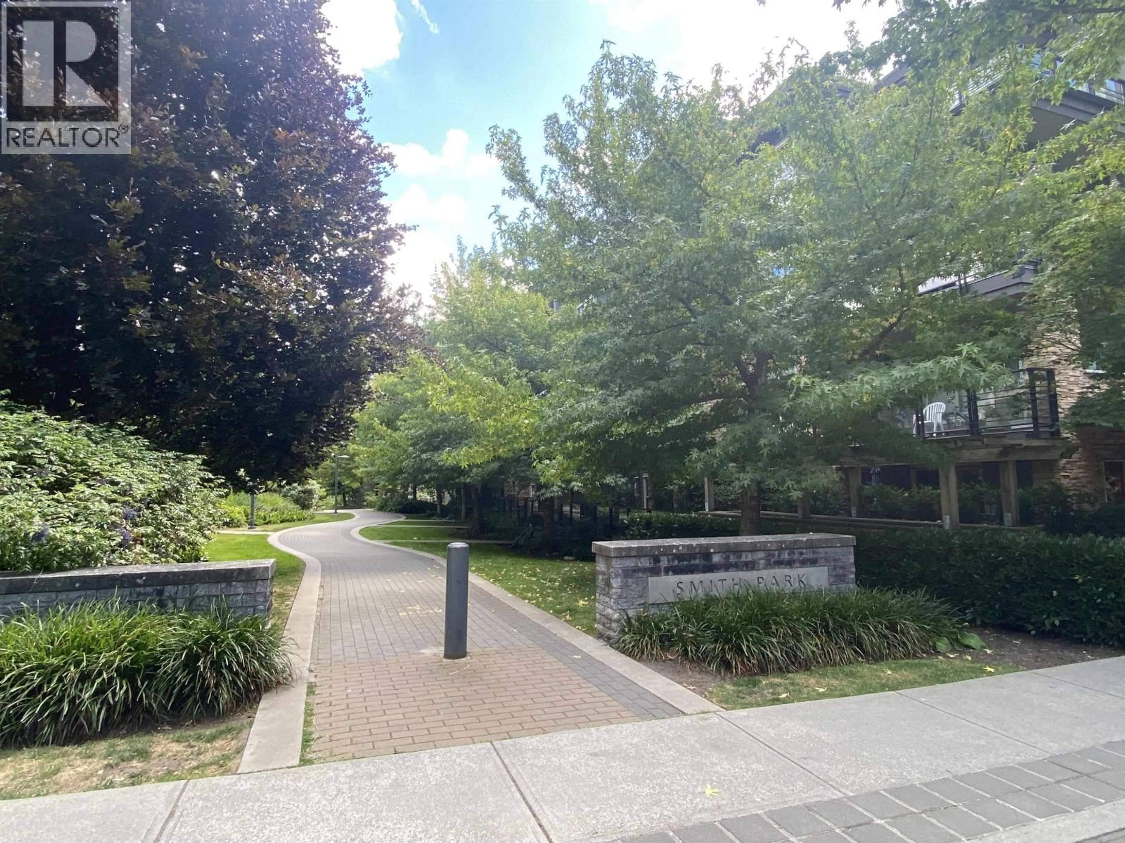 A pic from outside/outdoor area/front of a property/back of a property/a pic from drone, street for 213 - 3478 WESBROOK MALL, Vancouver British Columbia V6S0B6