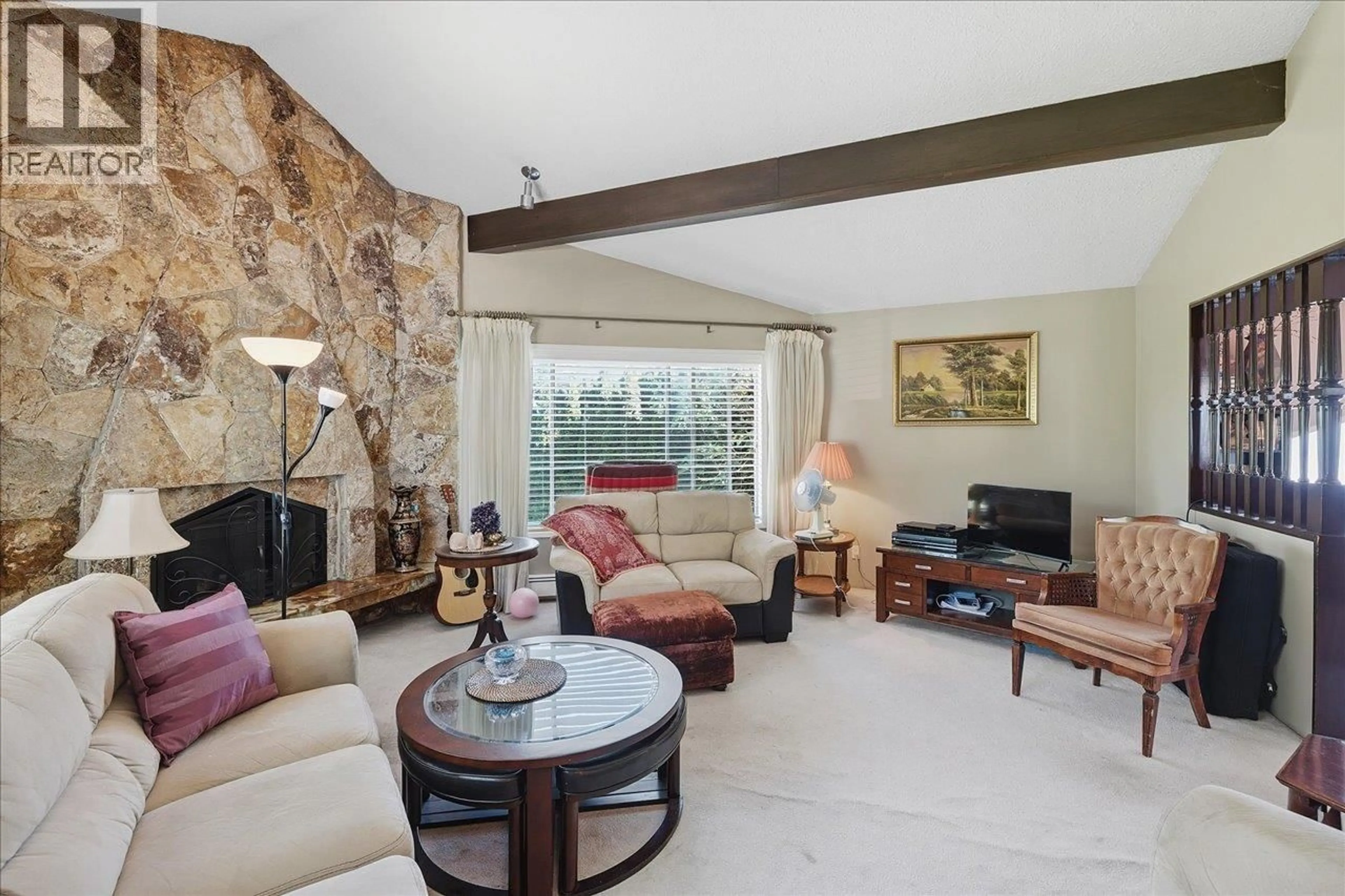 Living room with furniture, ceramic/tile floor for 2095 31ST AVENUE, Vancouver British Columbia V5N3B3