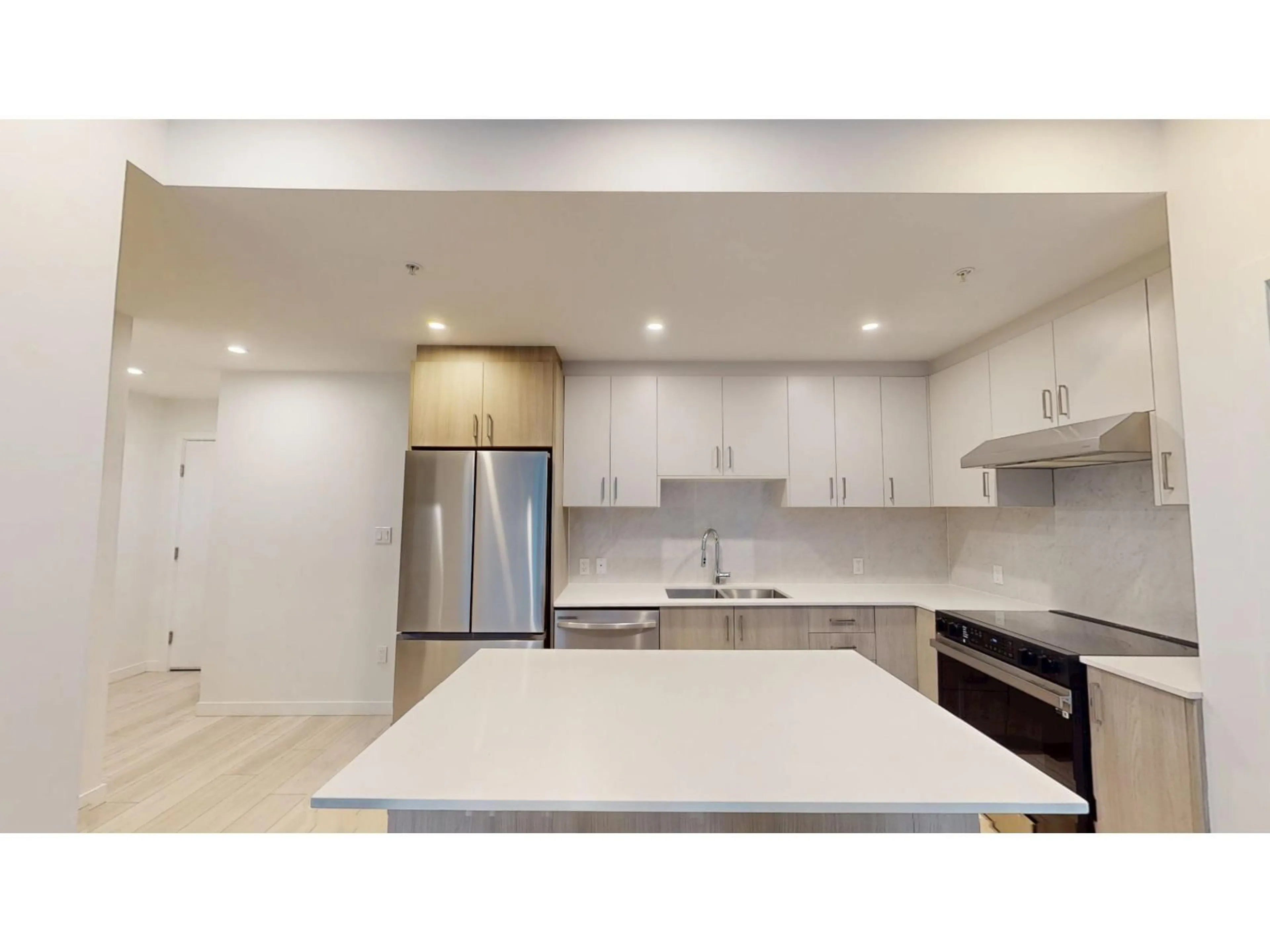 Open concept kitchen, unknown for 110 - 13838 108 AVENUE, Surrey British Columbia V3T0T8