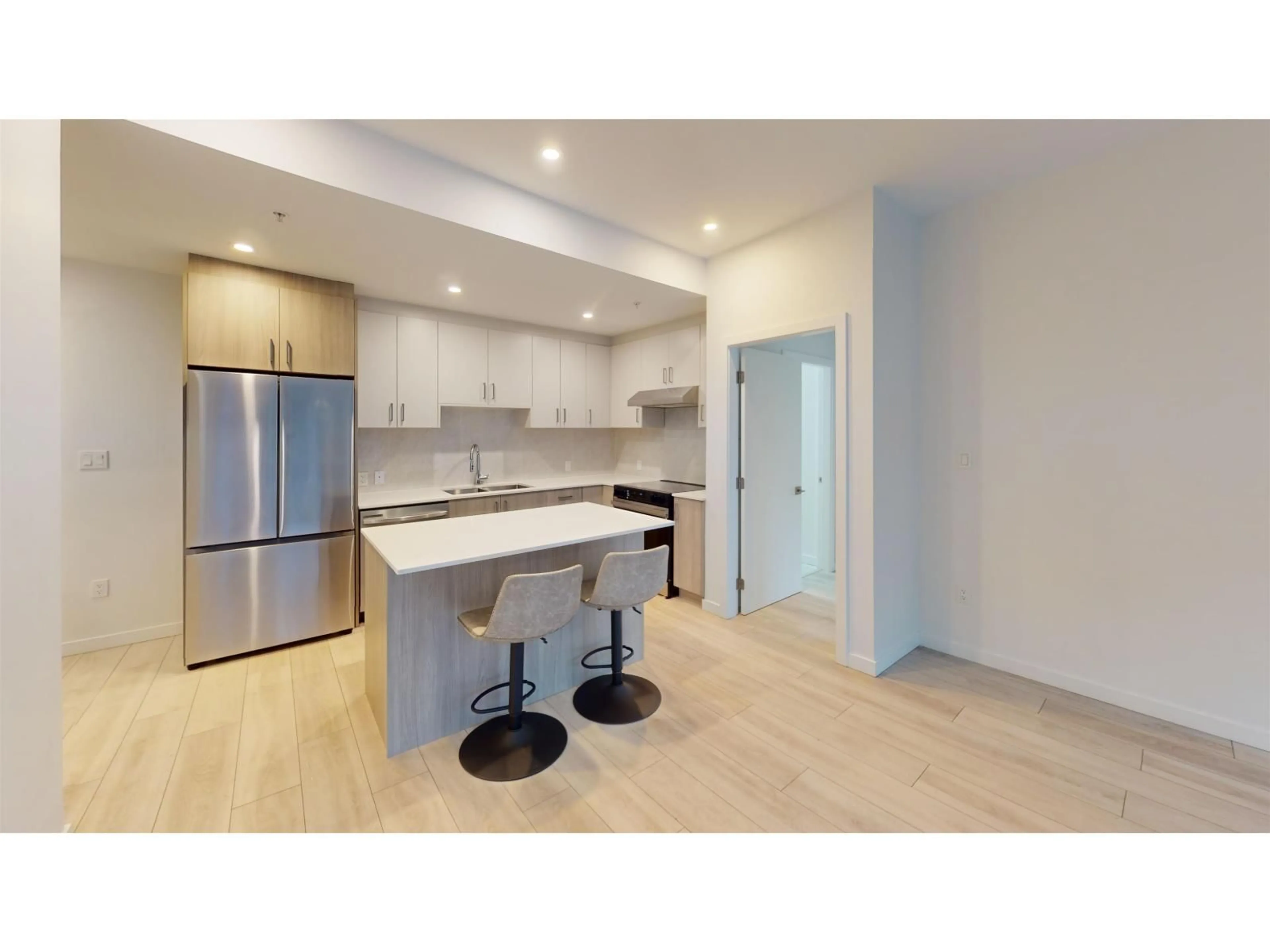 Open concept kitchen, unknown for 110 - 13838 108 AVENUE, Surrey British Columbia V3T0T8