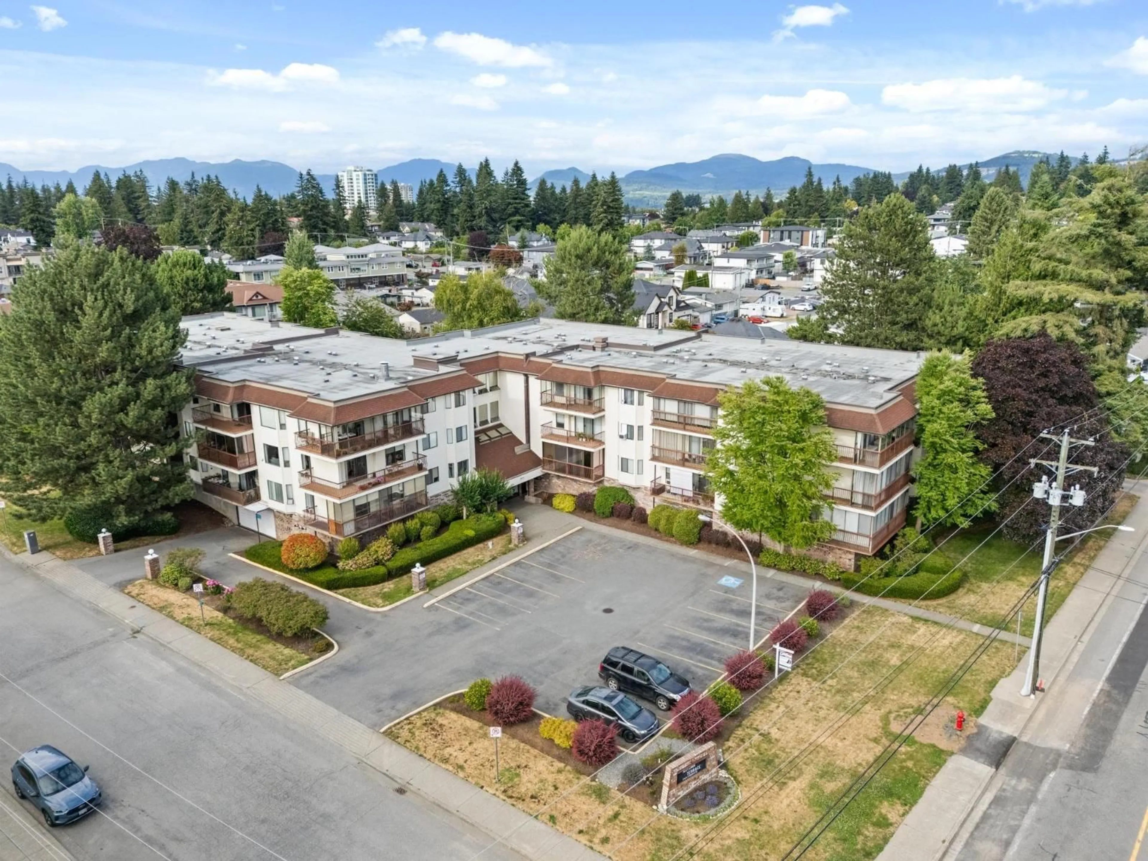 A pic from outside/outdoor area/front of a property/back of a property/a pic from drone, mountain view for 215 - 2414 CHURCH STREET, Abbotsford British Columbia V2T3J7