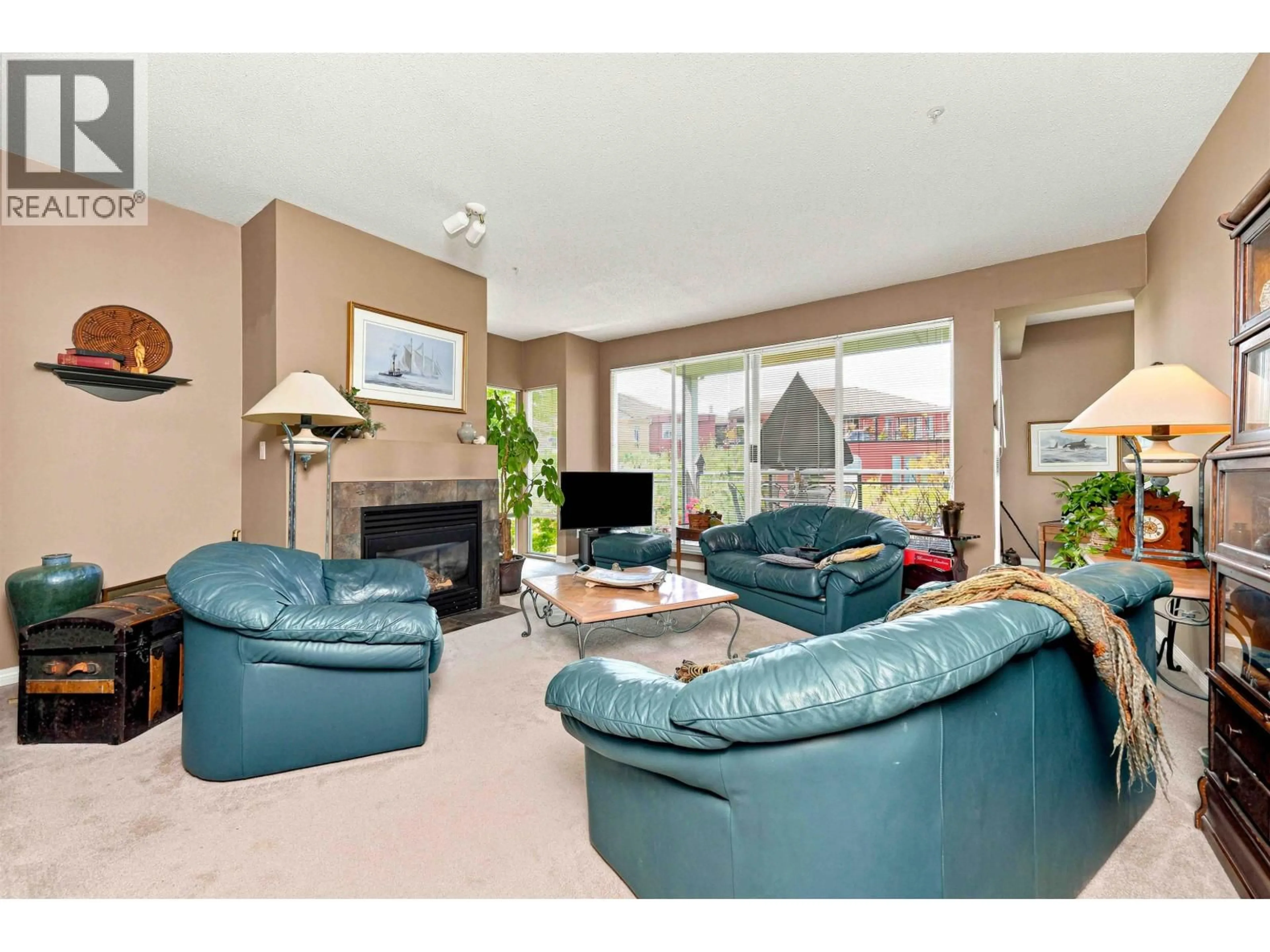 Living room with furniture, unknown for 308 - 8 LAGUNA COURT, New Westminster British Columbia V3M6M6