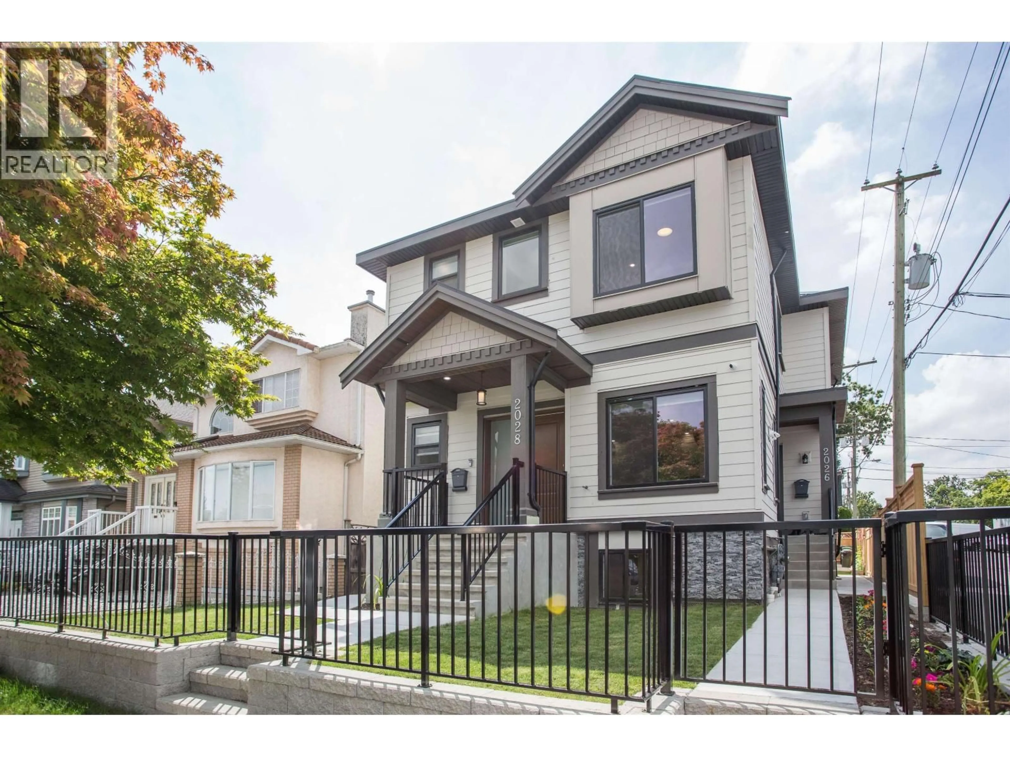 Home with vinyl exterior material, street for 2028 42ND AVENUE, Vancouver British Columbia V5P1L8