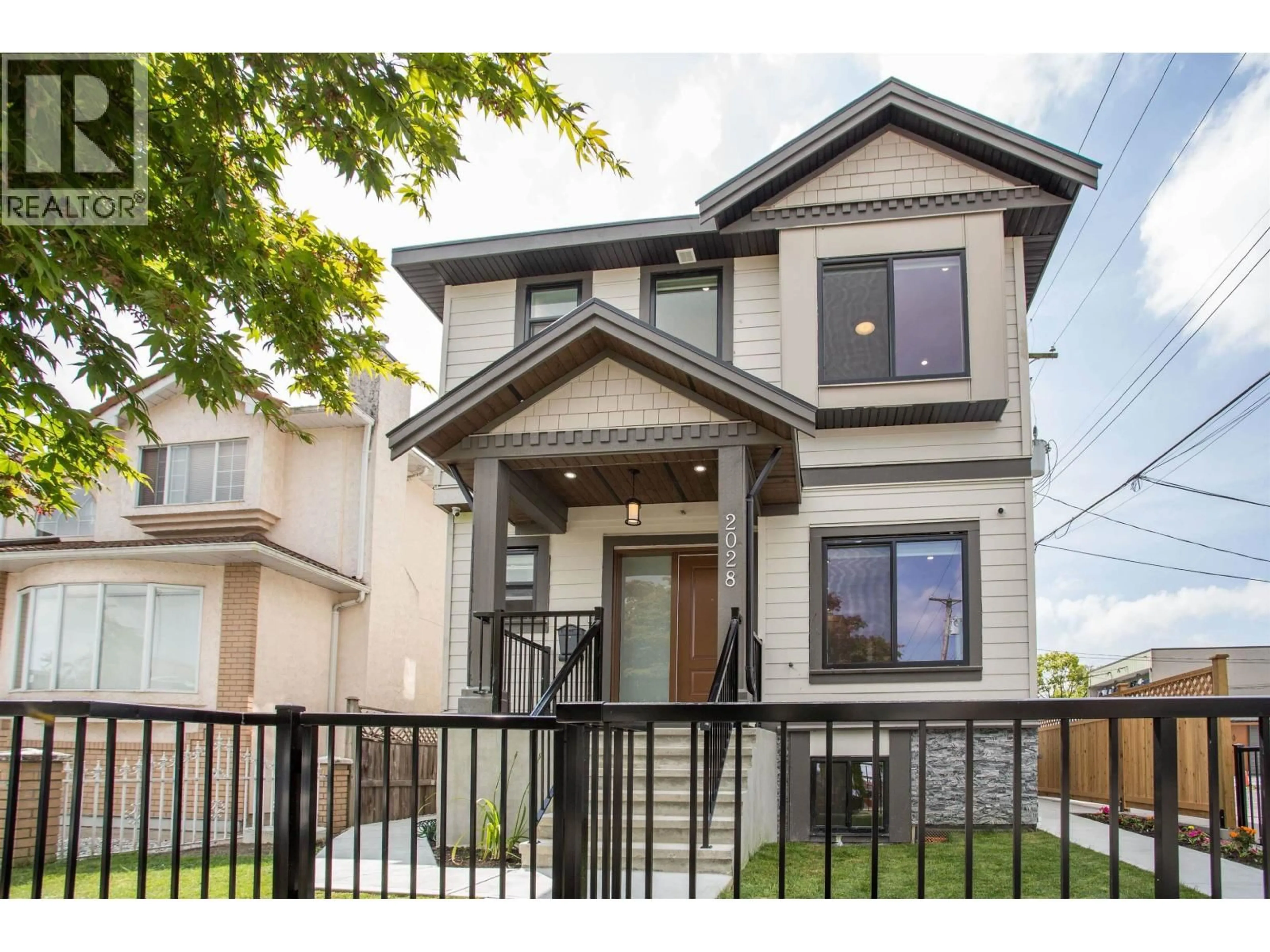 Home with vinyl exterior material, street for 2028 42ND AVENUE, Vancouver British Columbia V5P1L8