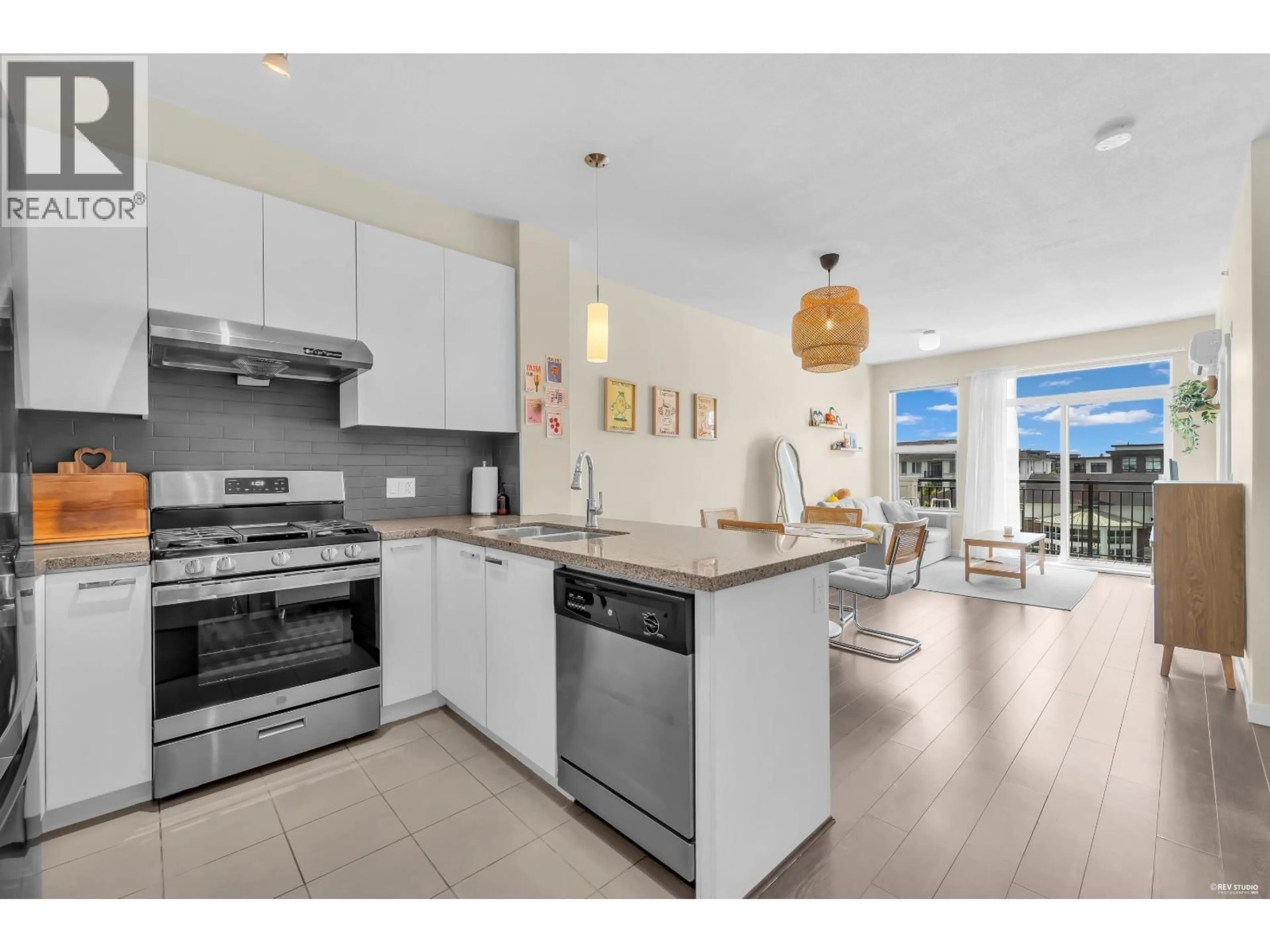 Open concept kitchen, ceramic/tile floor for 430 - 9388 MCKIM WAY, Richmond British Columbia V6X0J7