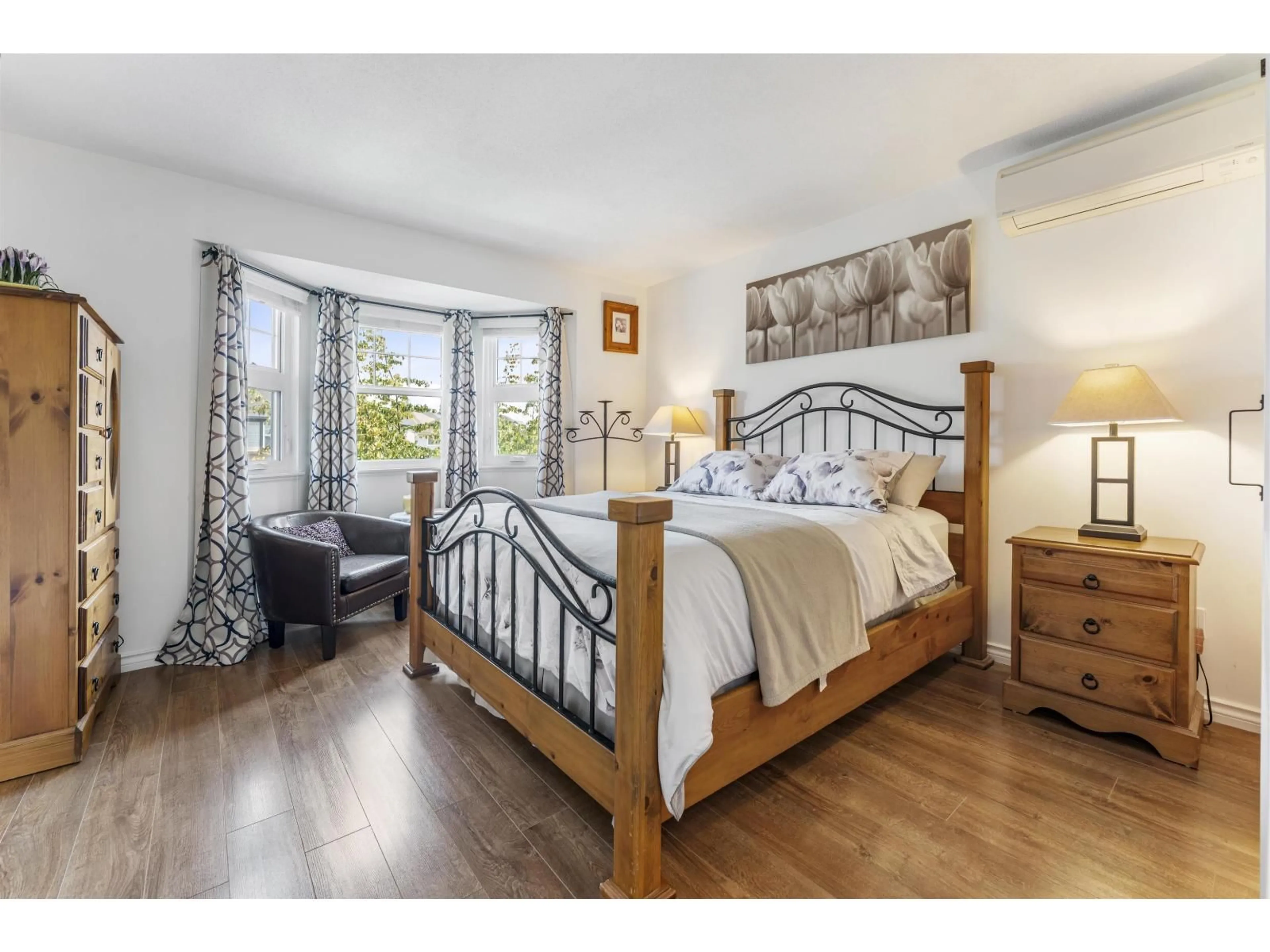 Bedroom with bed, wood/laminate floor for 14876 56A AVENUE, Surrey British Columbia V3S8X1