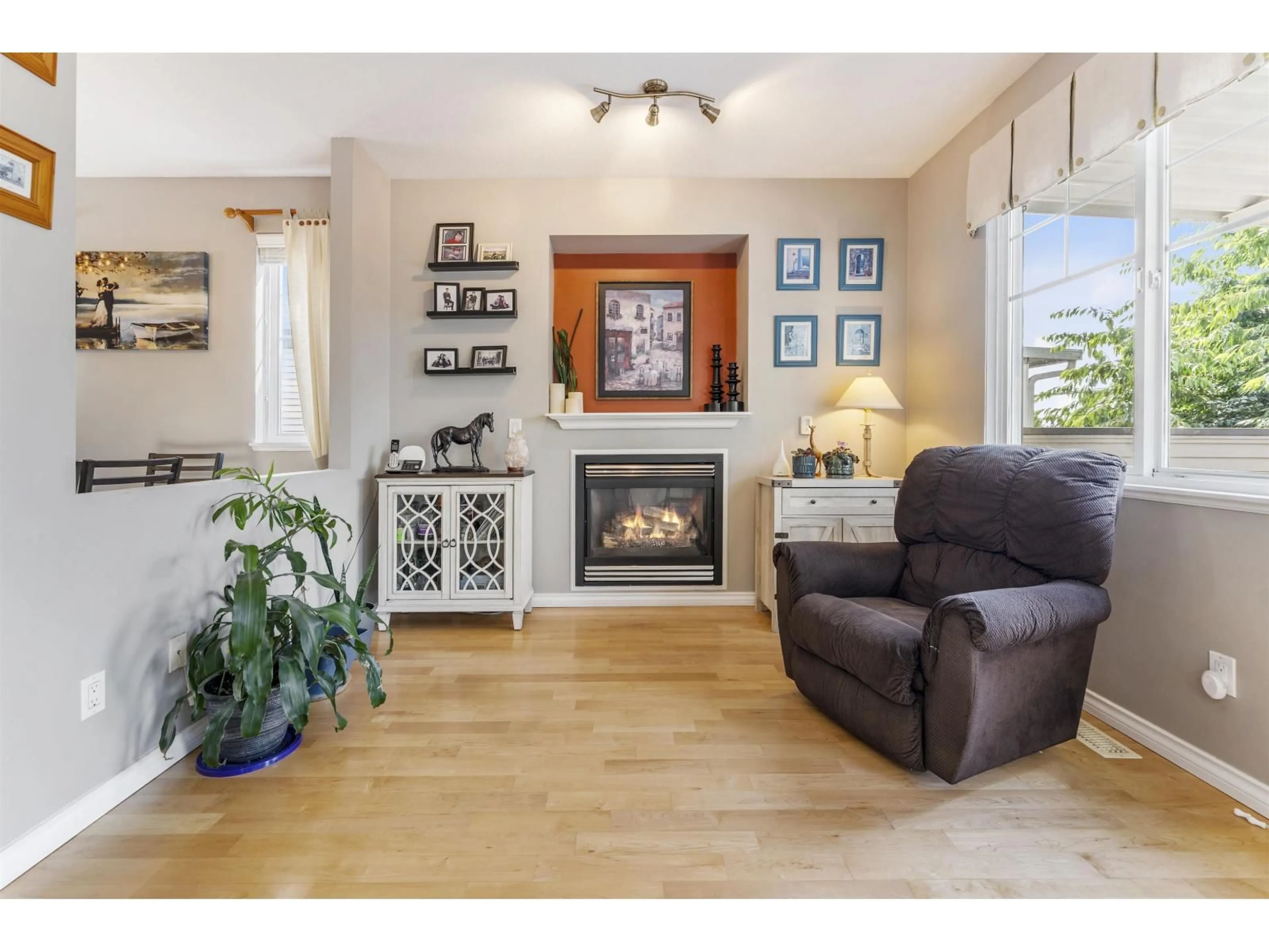 Living room with furniture, wood/laminate floor for 14876 56A AVENUE, Surrey British Columbia V3S8X1